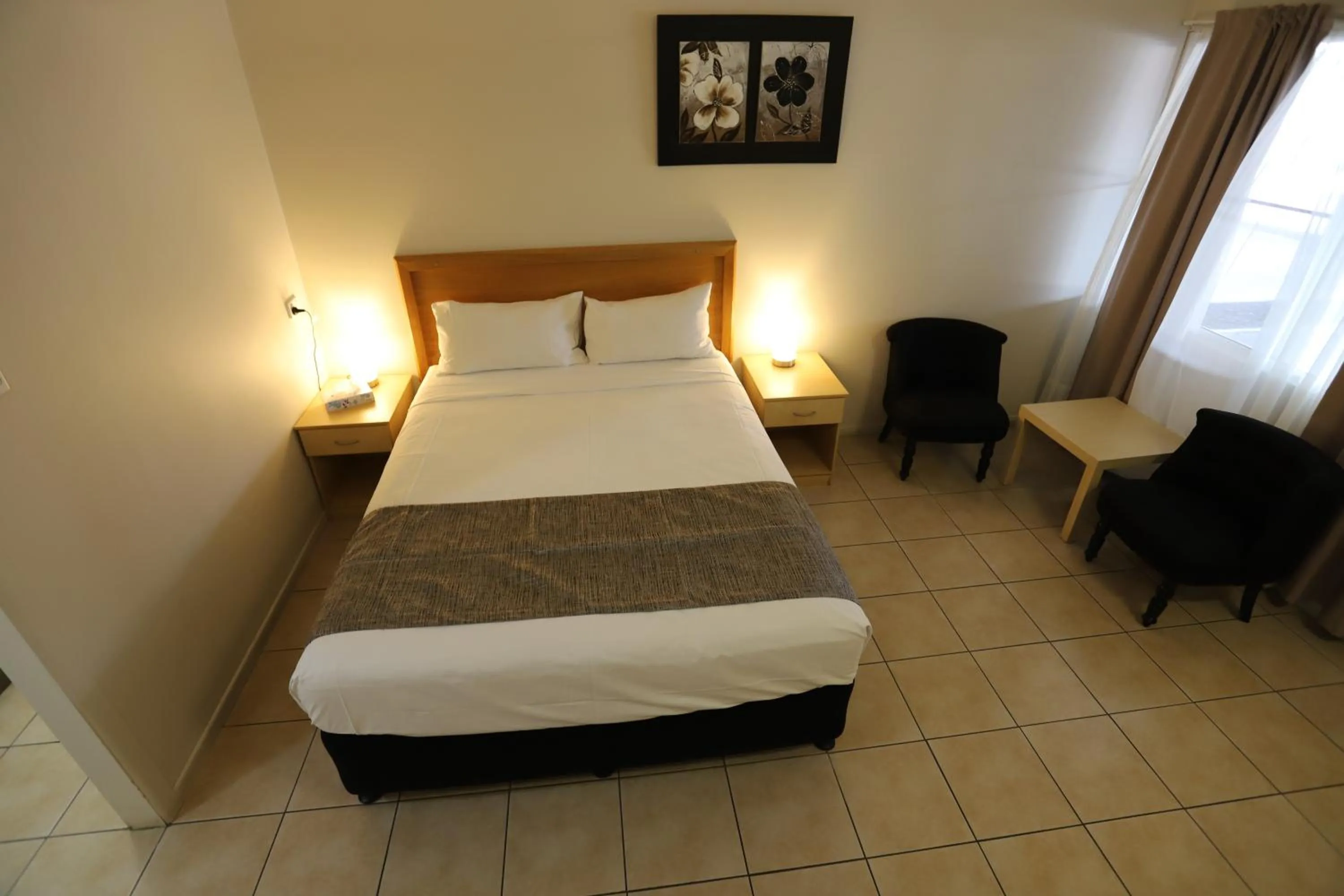 Bed in Tropic Coast Motel