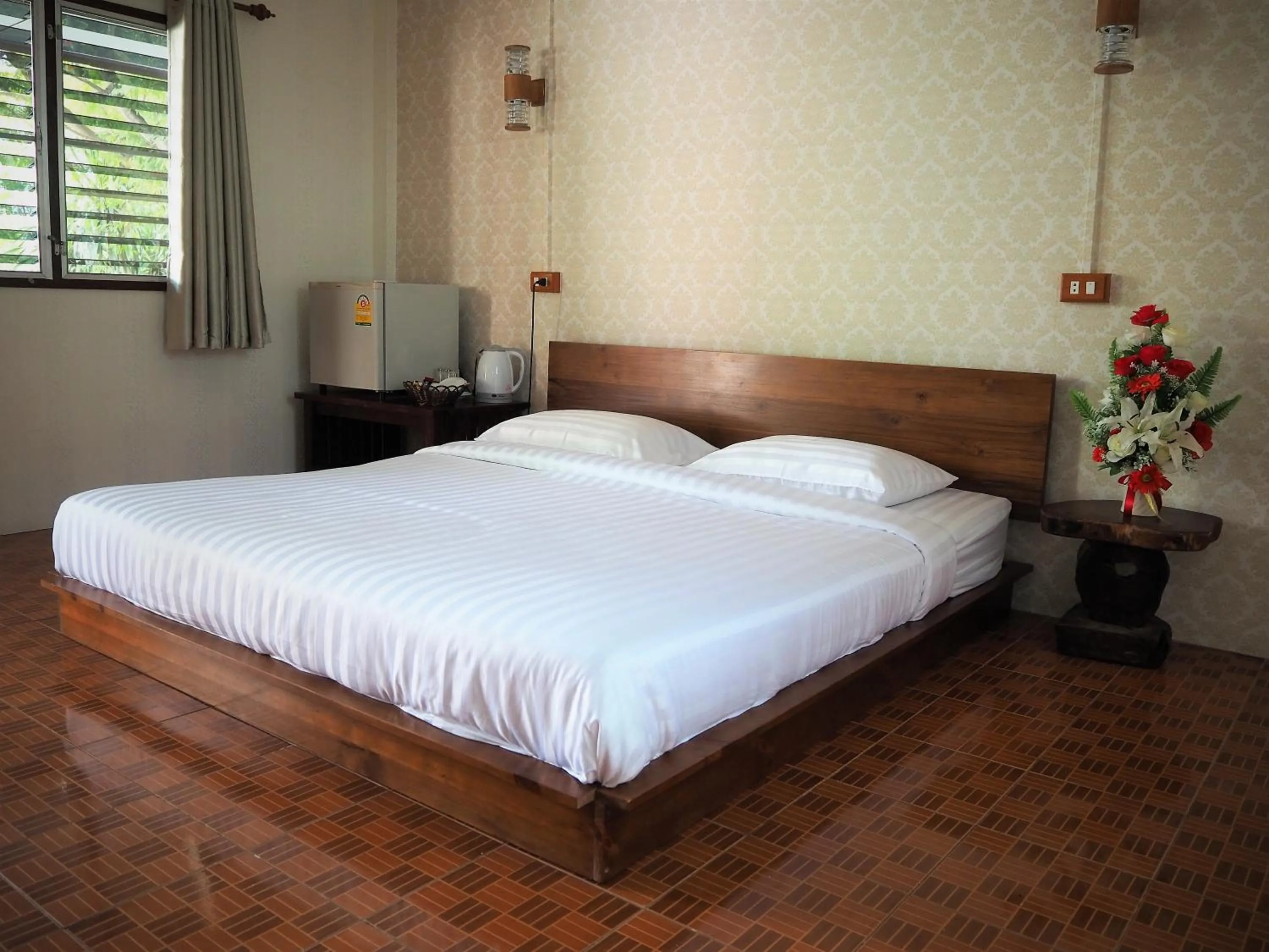 Bed in T & T Hostel Kanchanaburi