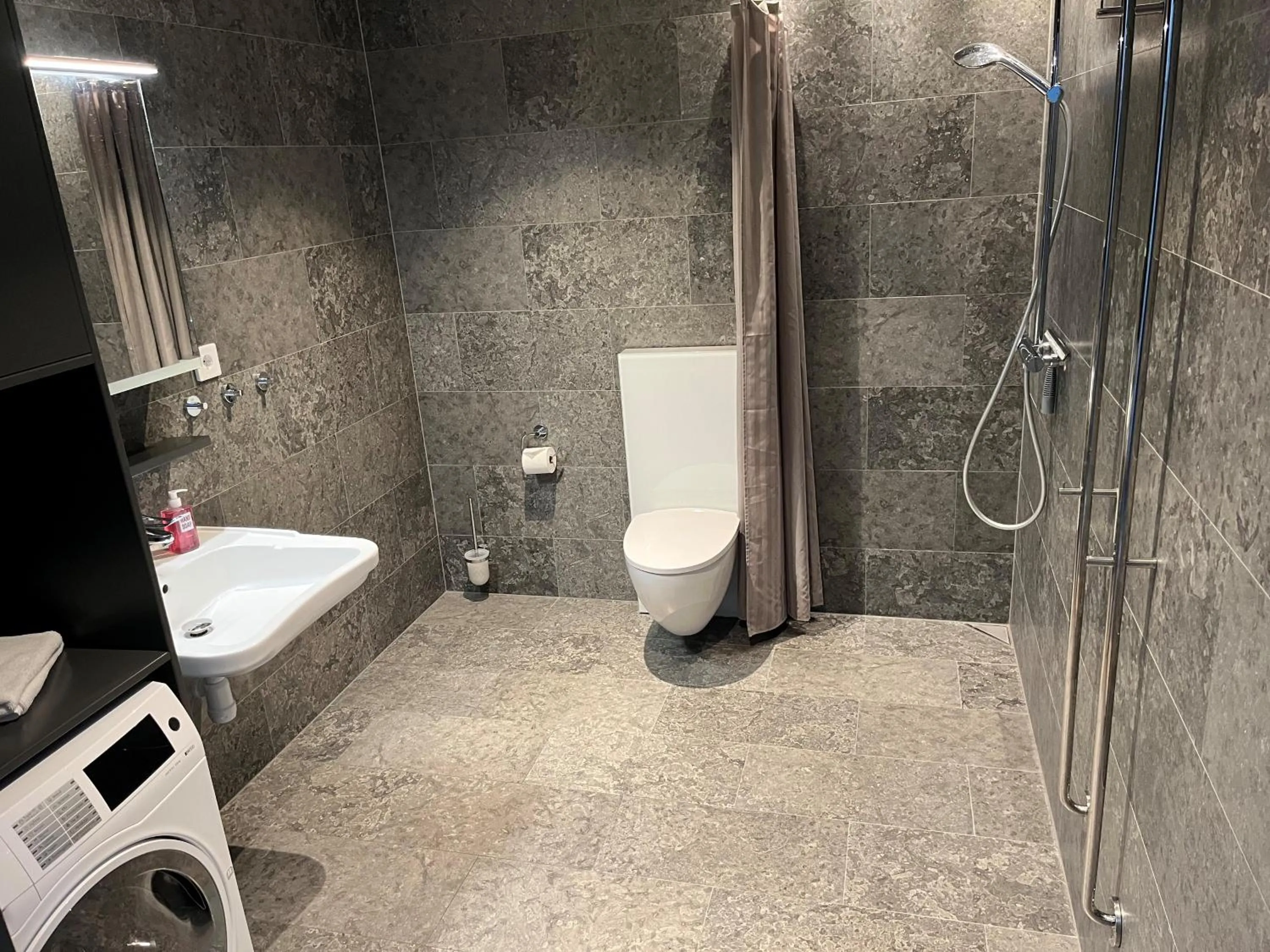 Shower in ÅhusBrygga Apartment Hotel