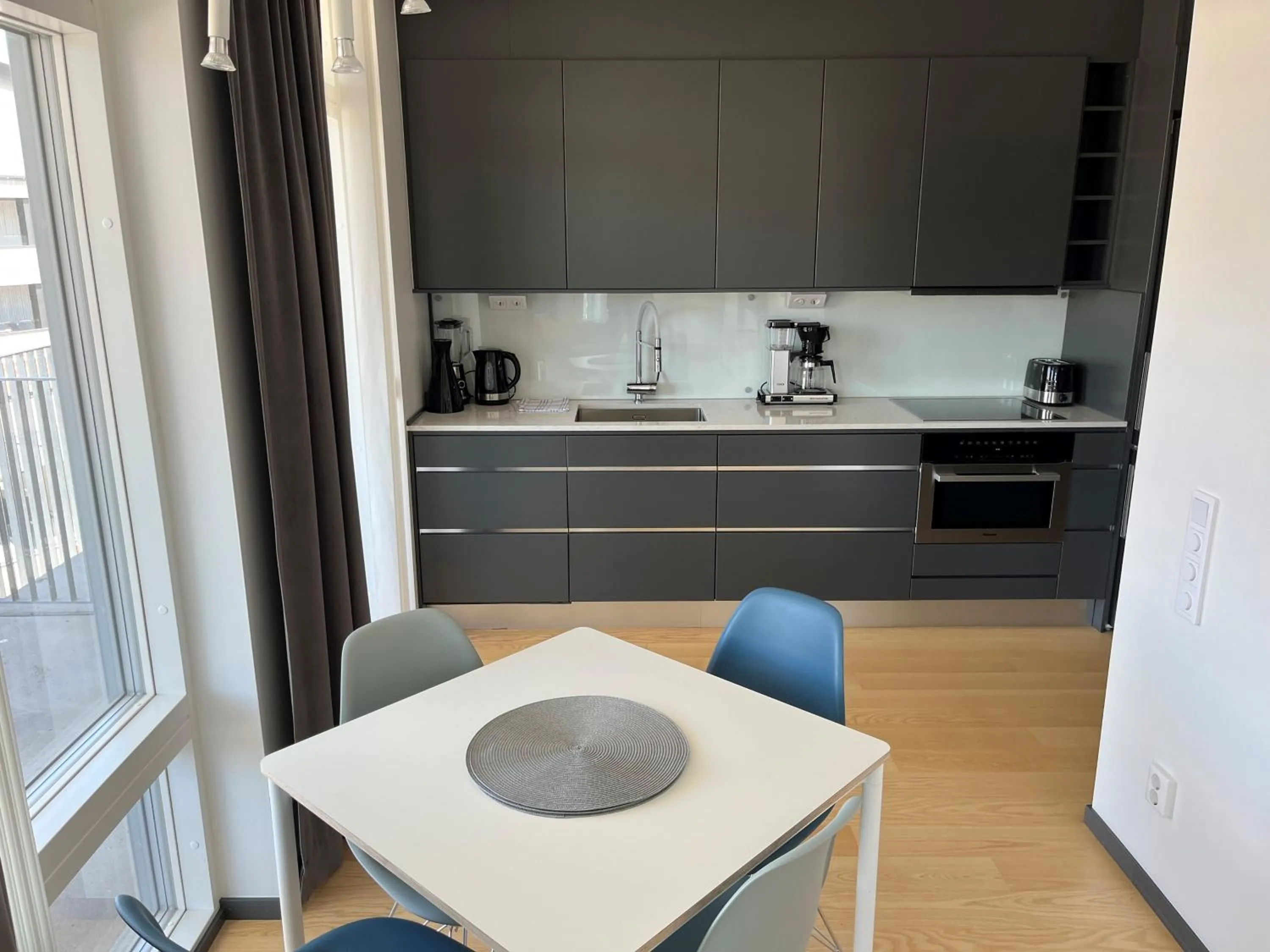 Kitchen or kitchenette in ÅhusBrygga Apartment Hotel