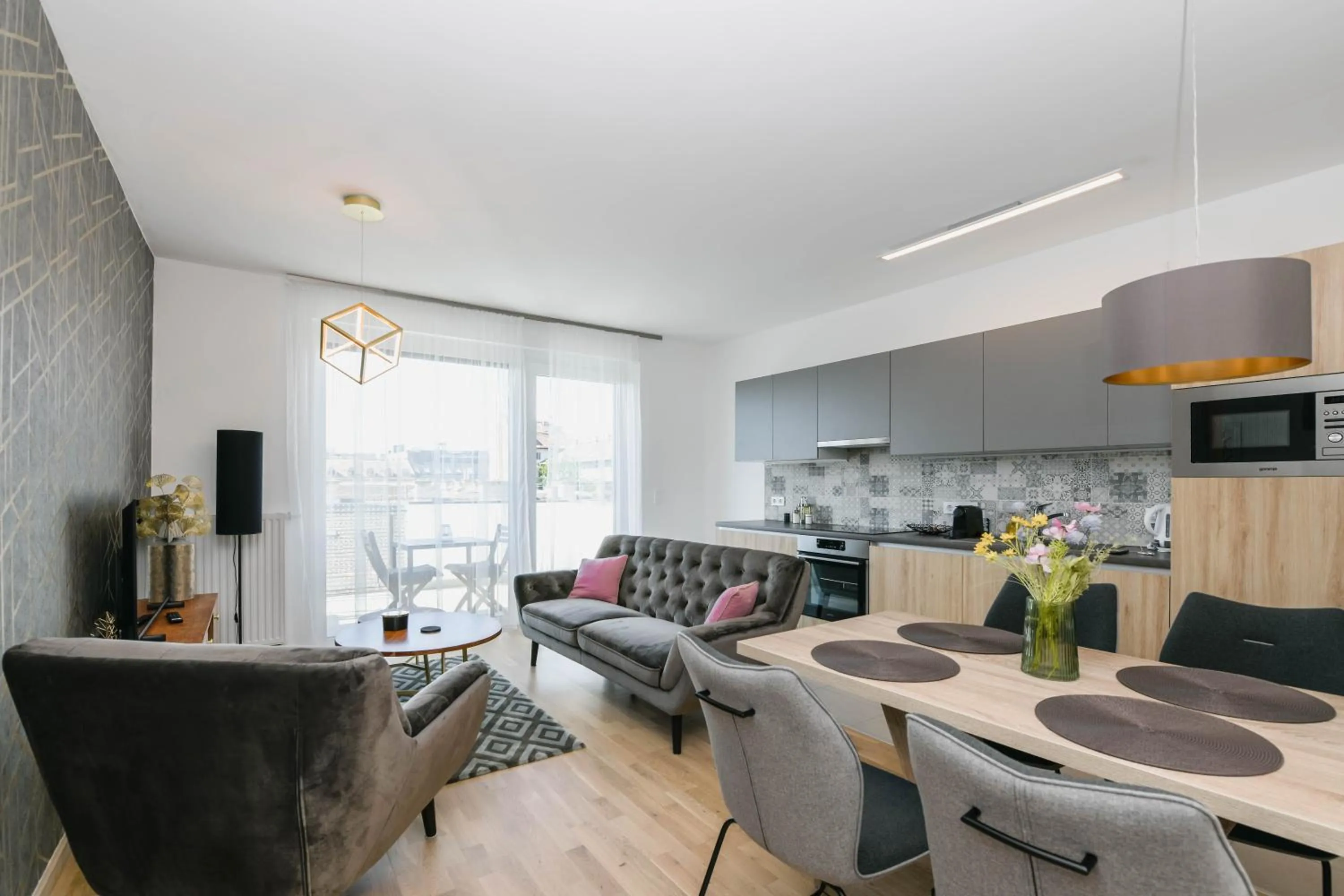 Communal lounge/ TV room in Elisabeth Downtown Apartments by FirstHost