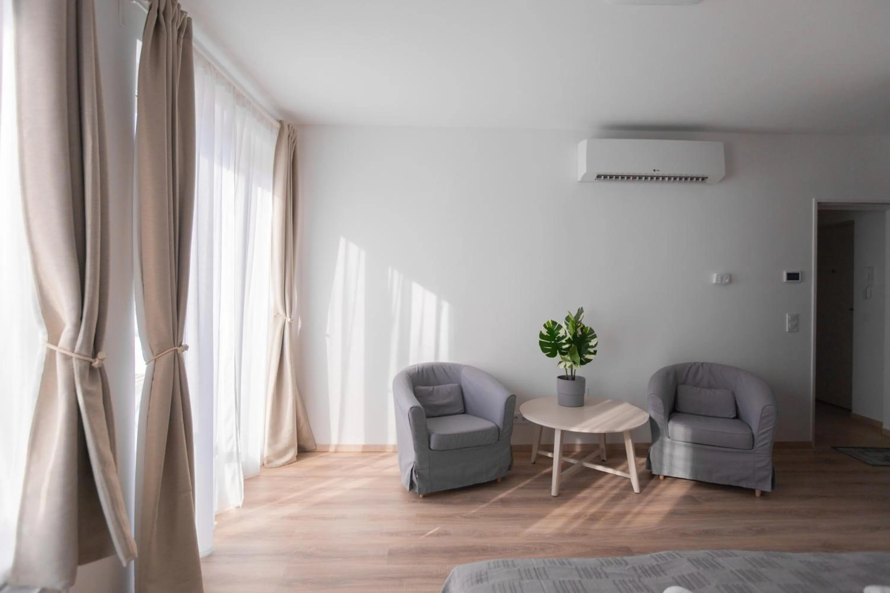 Living room in Elisabeth Downtown Apartments by FirstHost