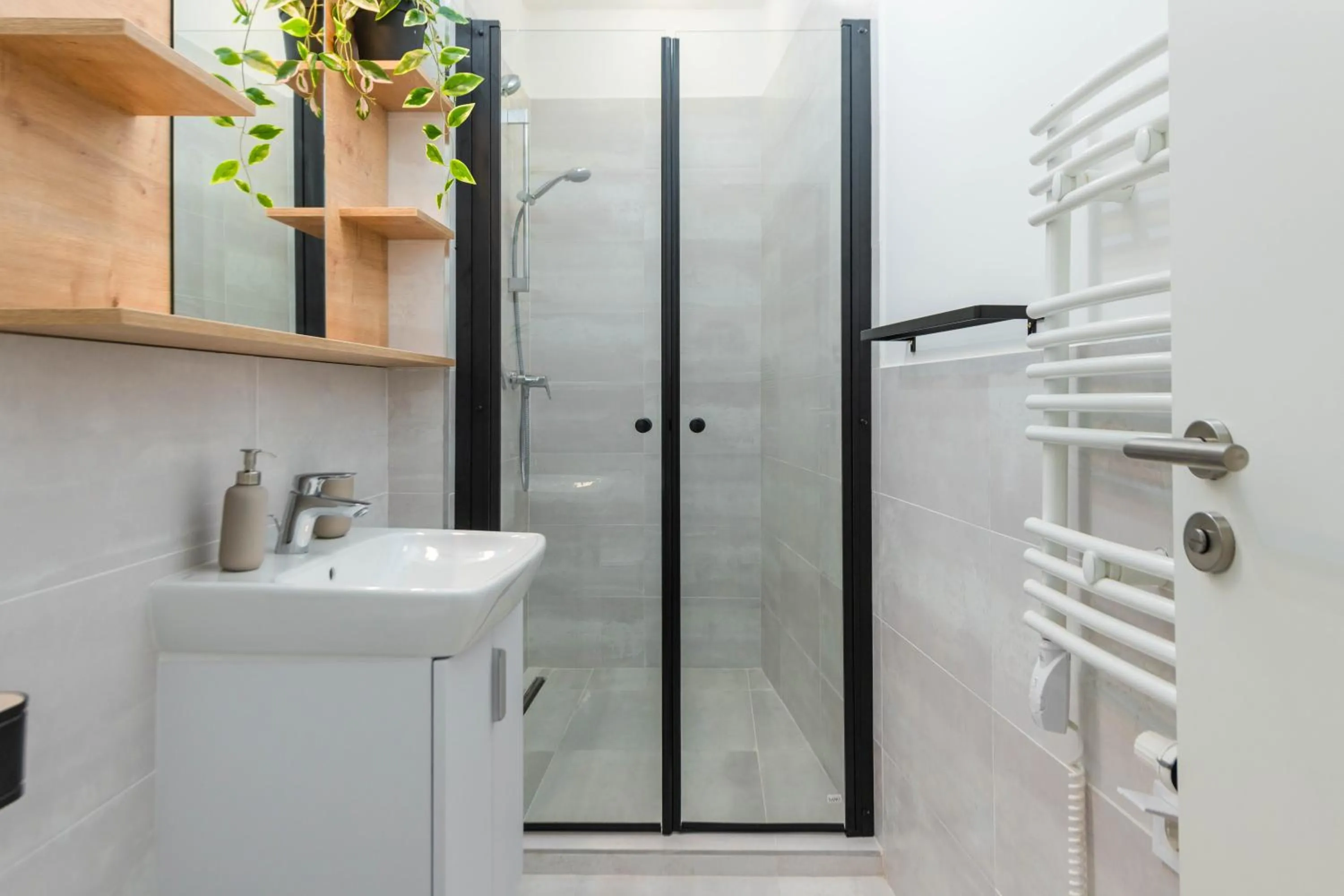 Shower in Elisabeth Downtown Apartments by FirstHost