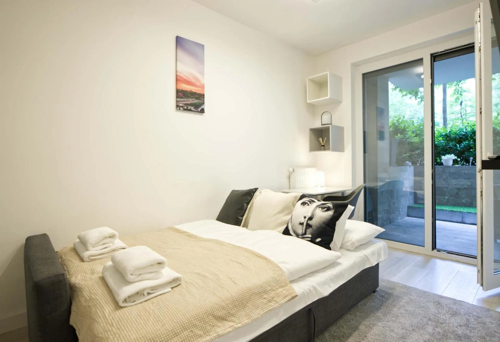 Bed in Elisabeth Downtown Apartments by FirstHost