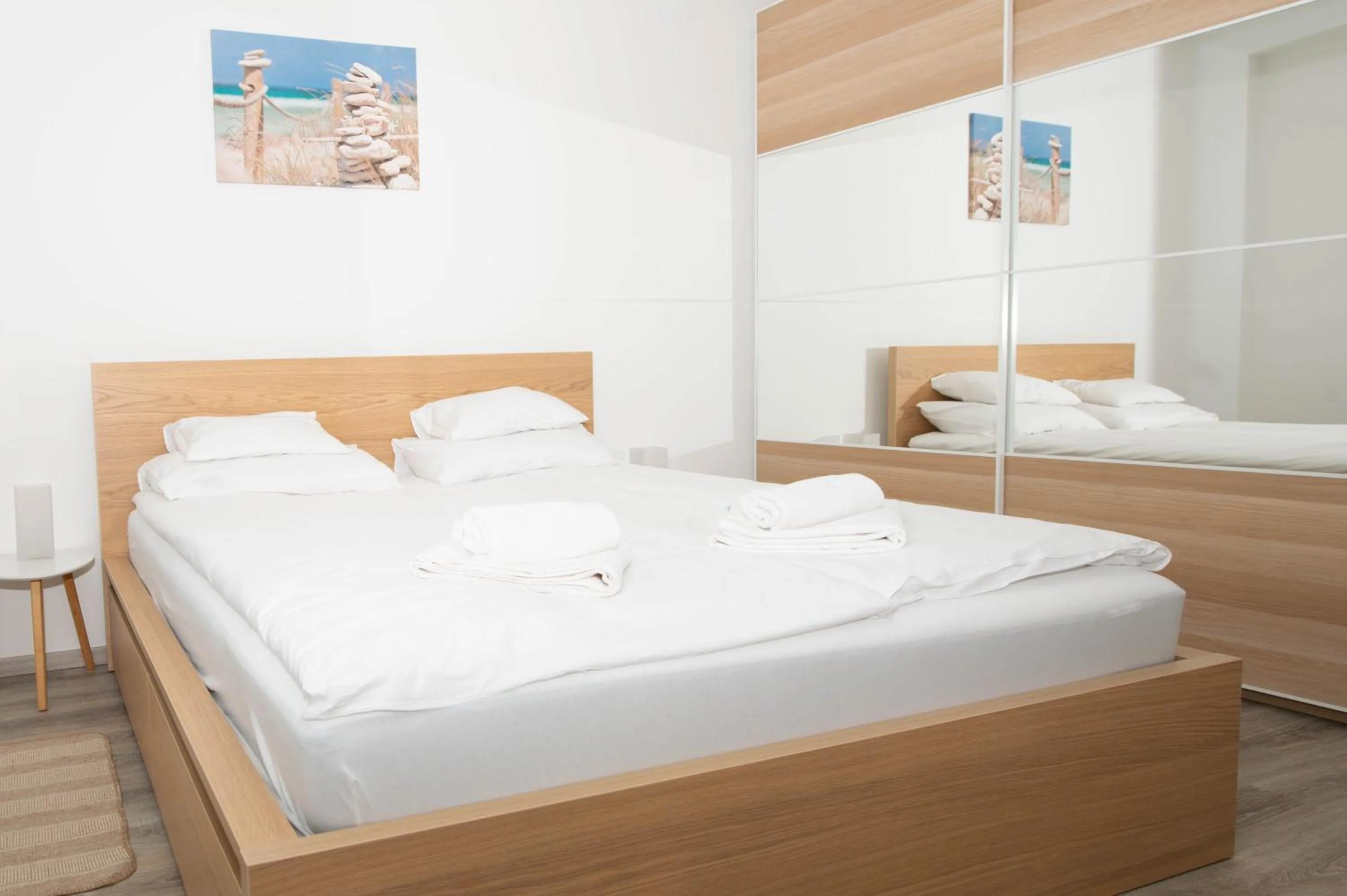 Bed in Elisabeth Downtown Apartments by FirstHost