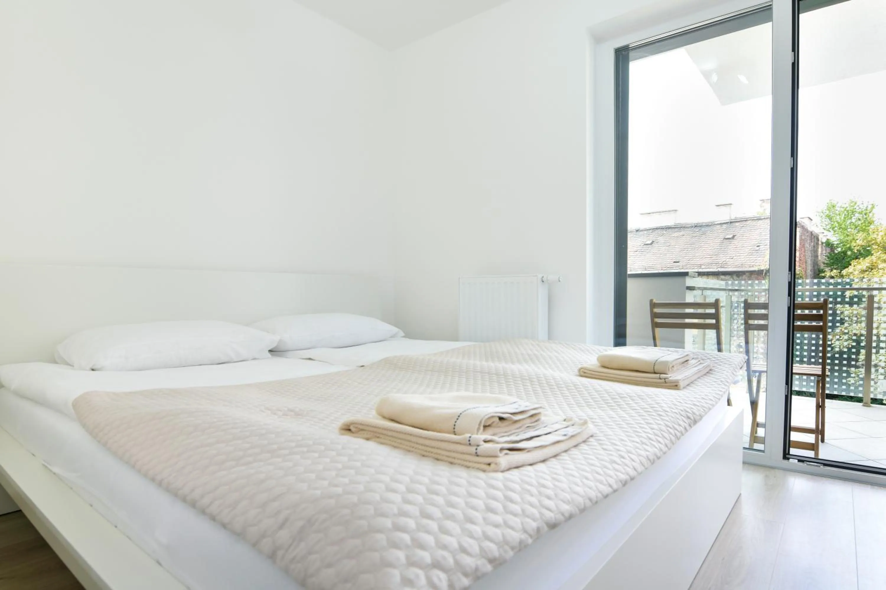 Bed in Elisabeth Downtown Apartments by FirstHost