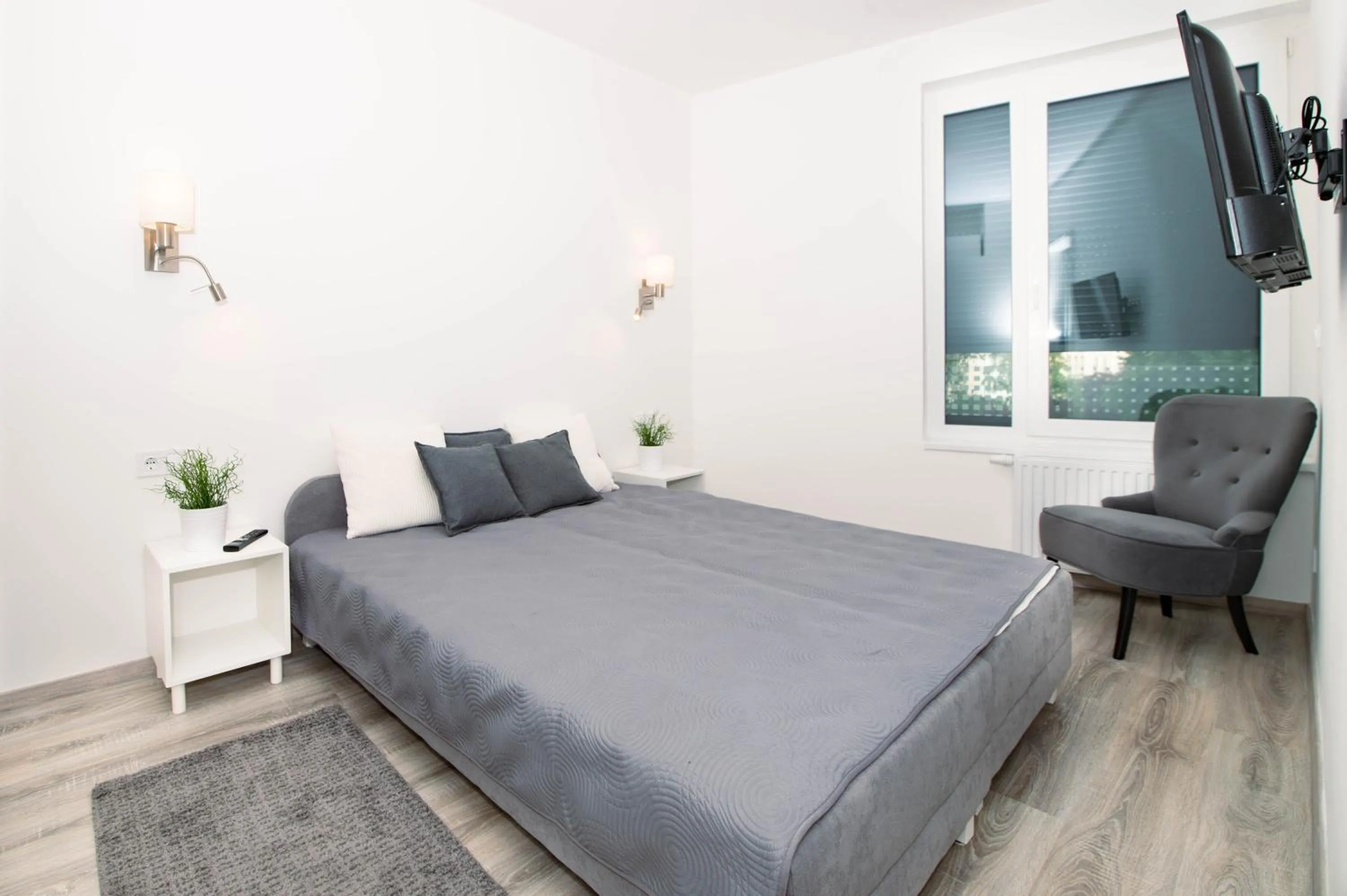 Bed in Elisabeth Downtown Apartments by FirstHost