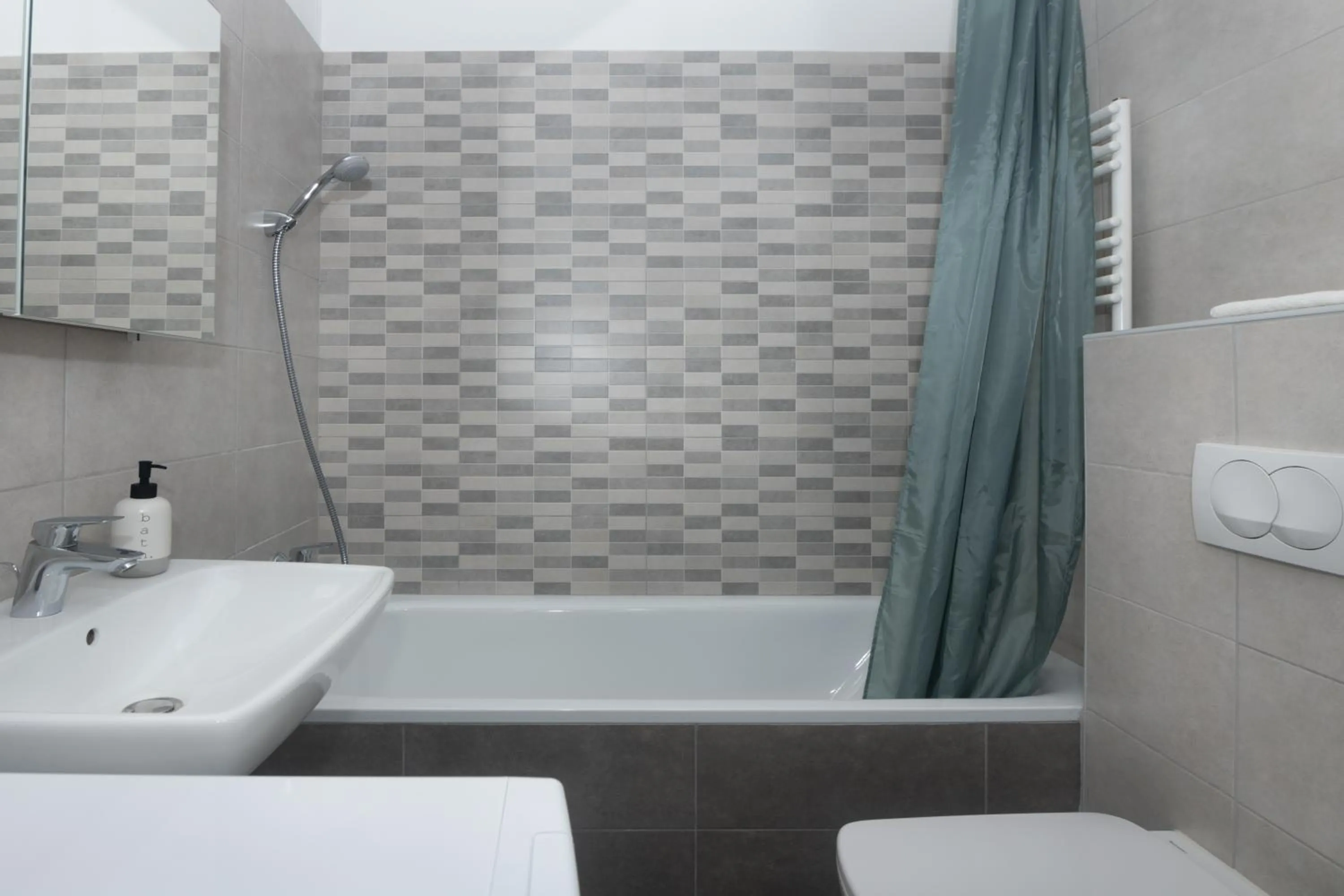 Shower in Elisabeth Downtown Apartments by FirstHost