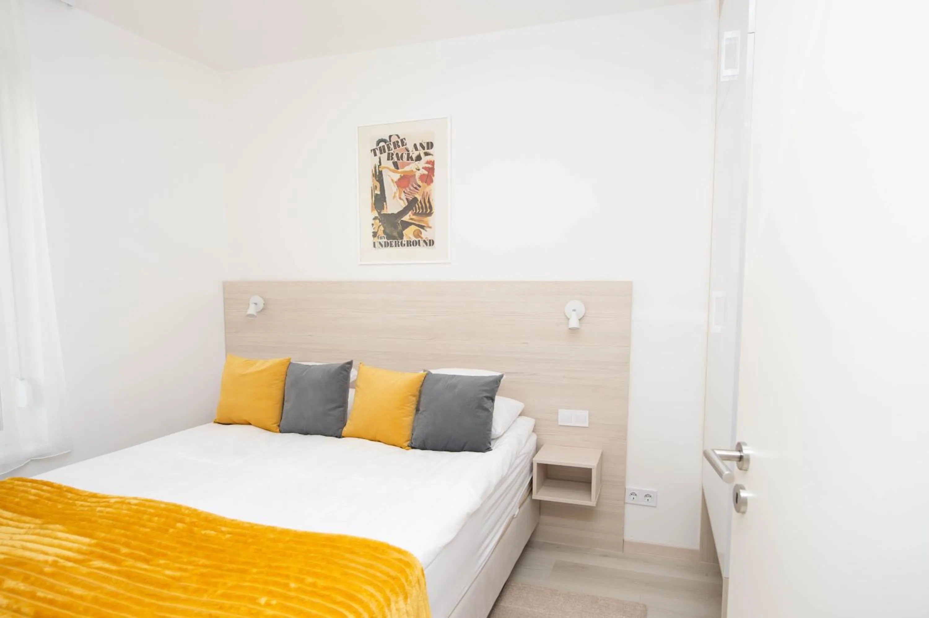 Bed in Elisabeth Downtown Apartments by FirstHost