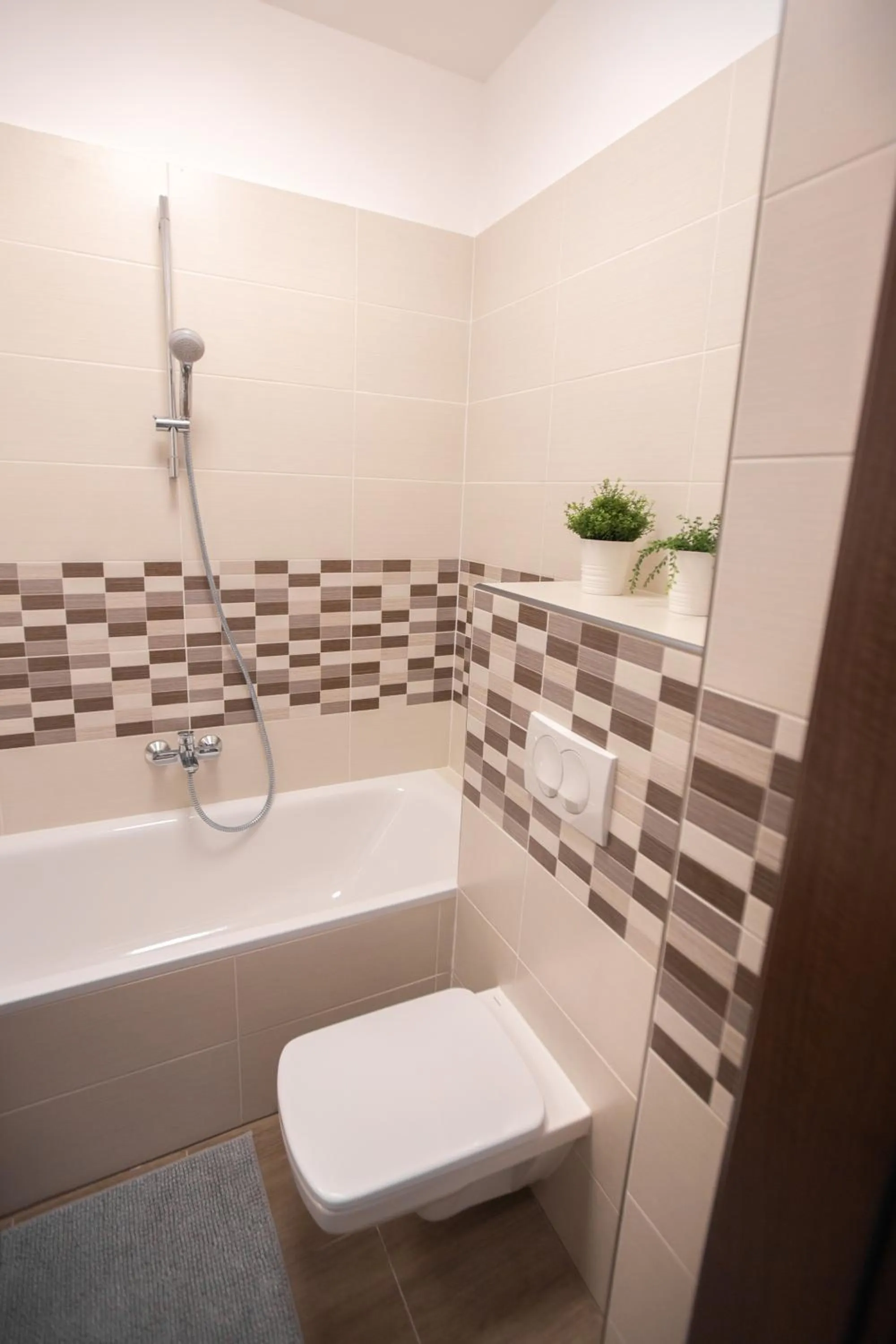 Shower in Elisabeth Downtown Apartments by FirstHost