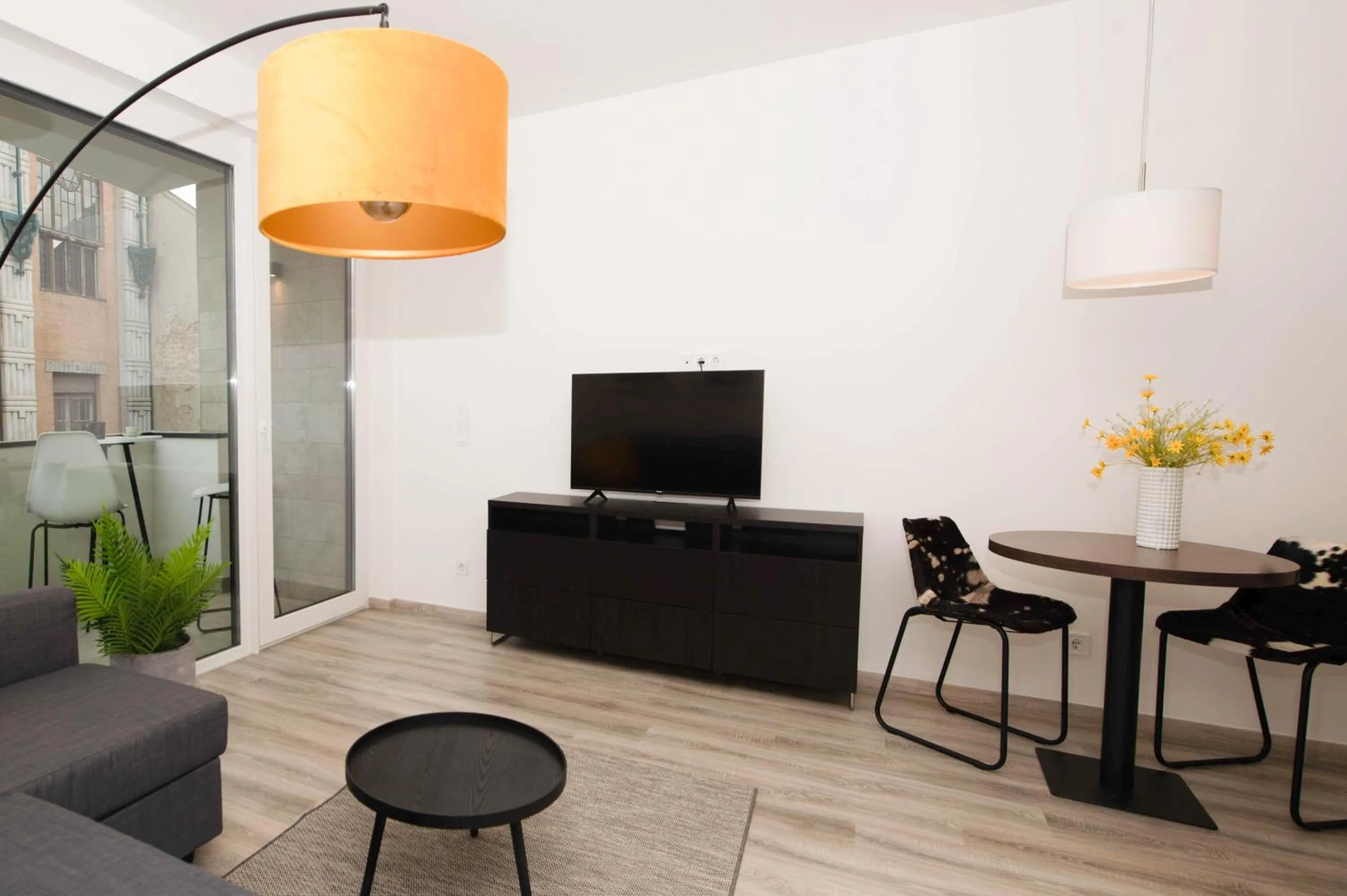 Communal lounge/ TV room in Elisabeth Downtown Apartments by FirstHost