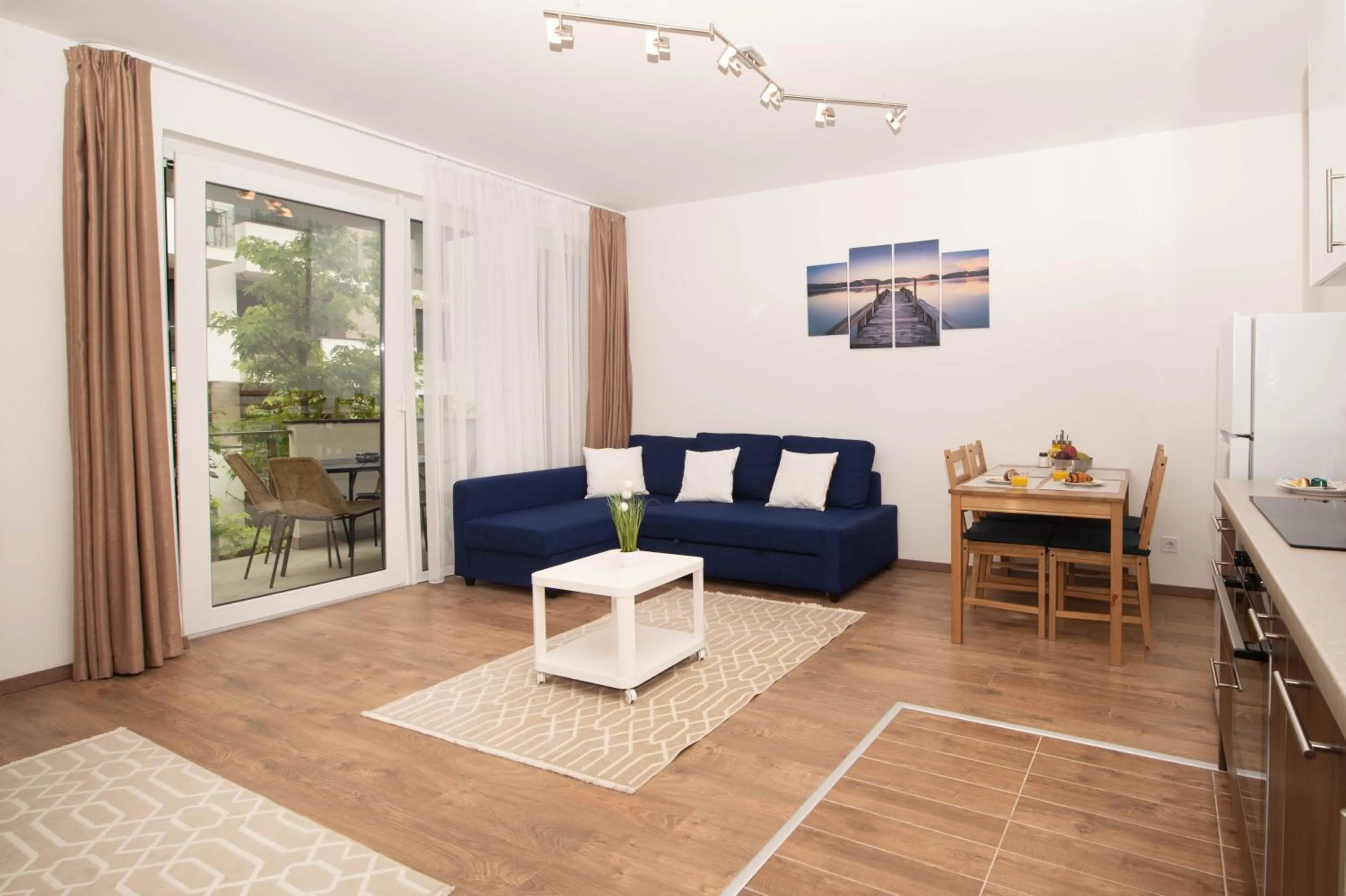 Communal lounge/ TV room in Elisabeth Downtown Apartments by FirstHost