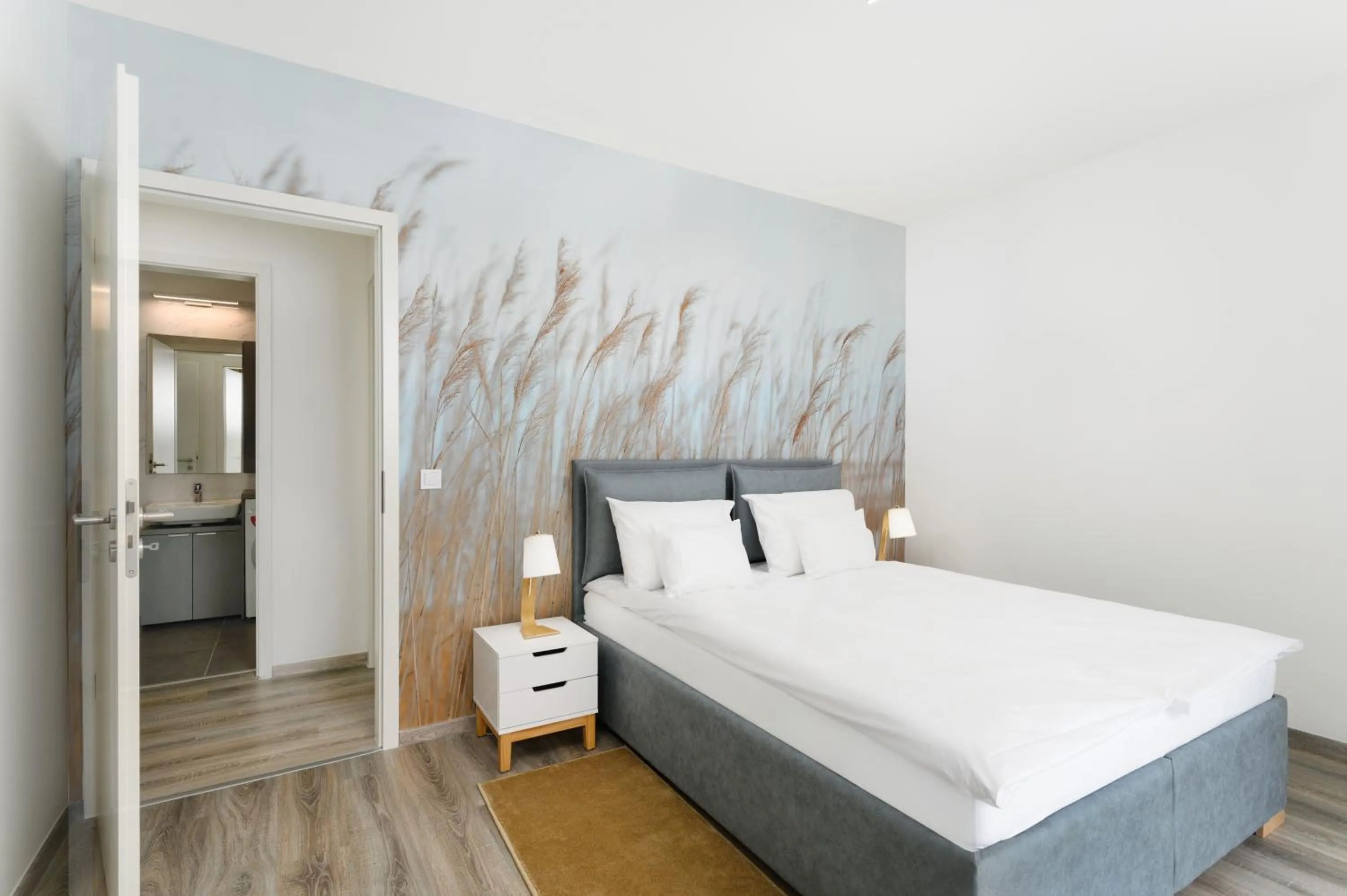 Bed in Elisabeth Downtown Apartments by FirstHost