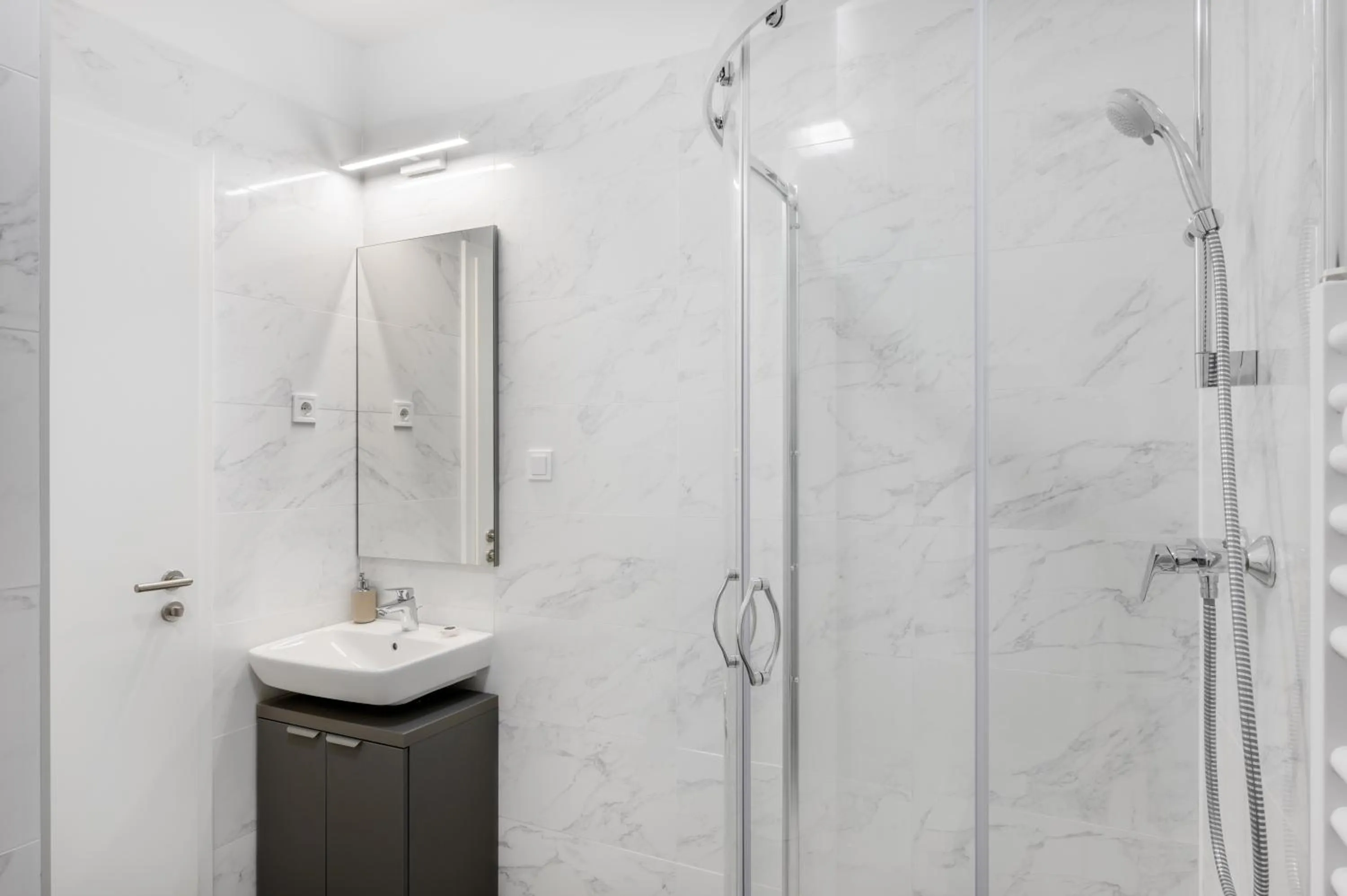 Shower in Elisabeth Downtown Apartments by FirstHost