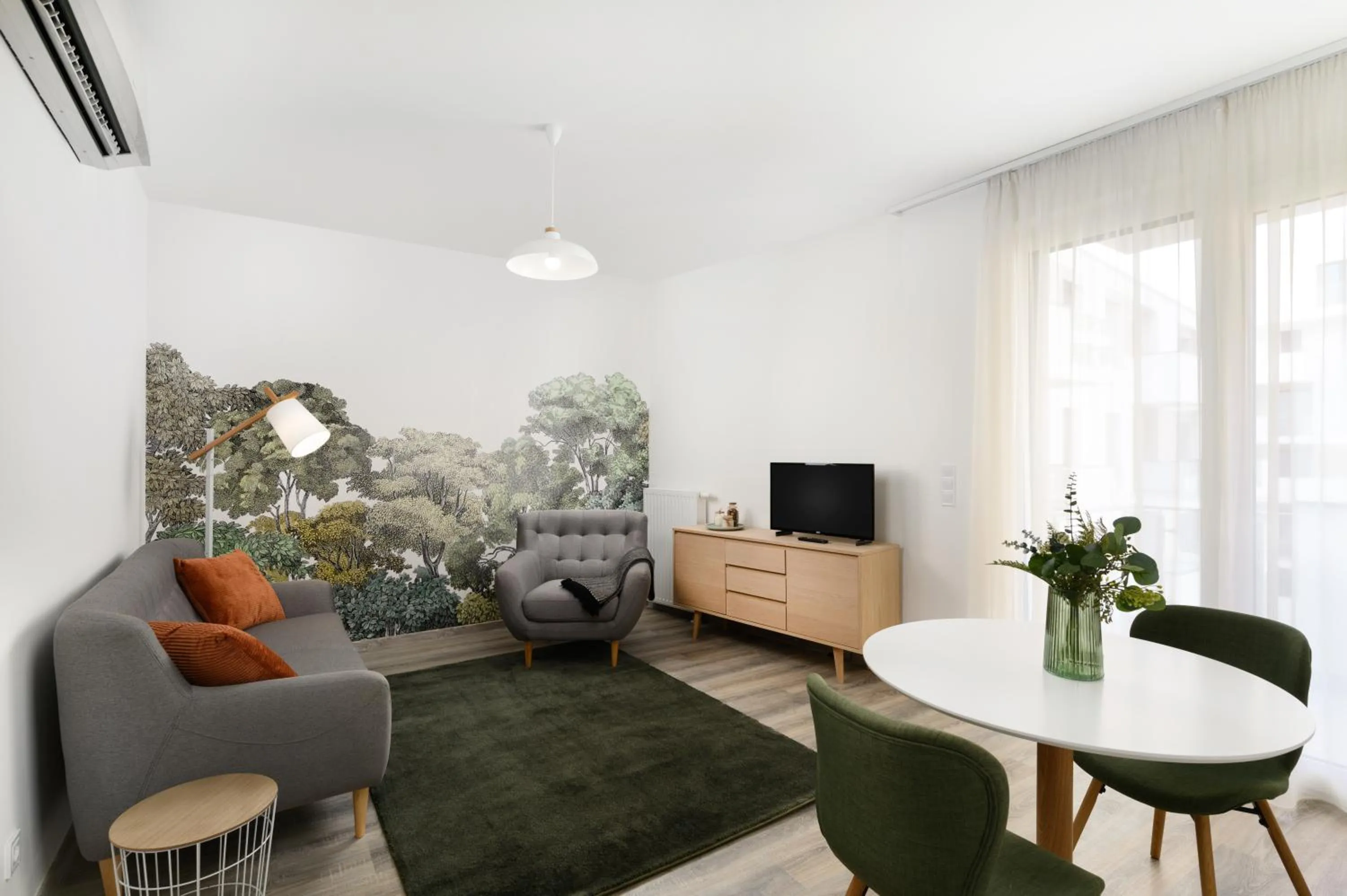 Communal lounge/ TV room in Elisabeth Downtown Apartments by FirstHost