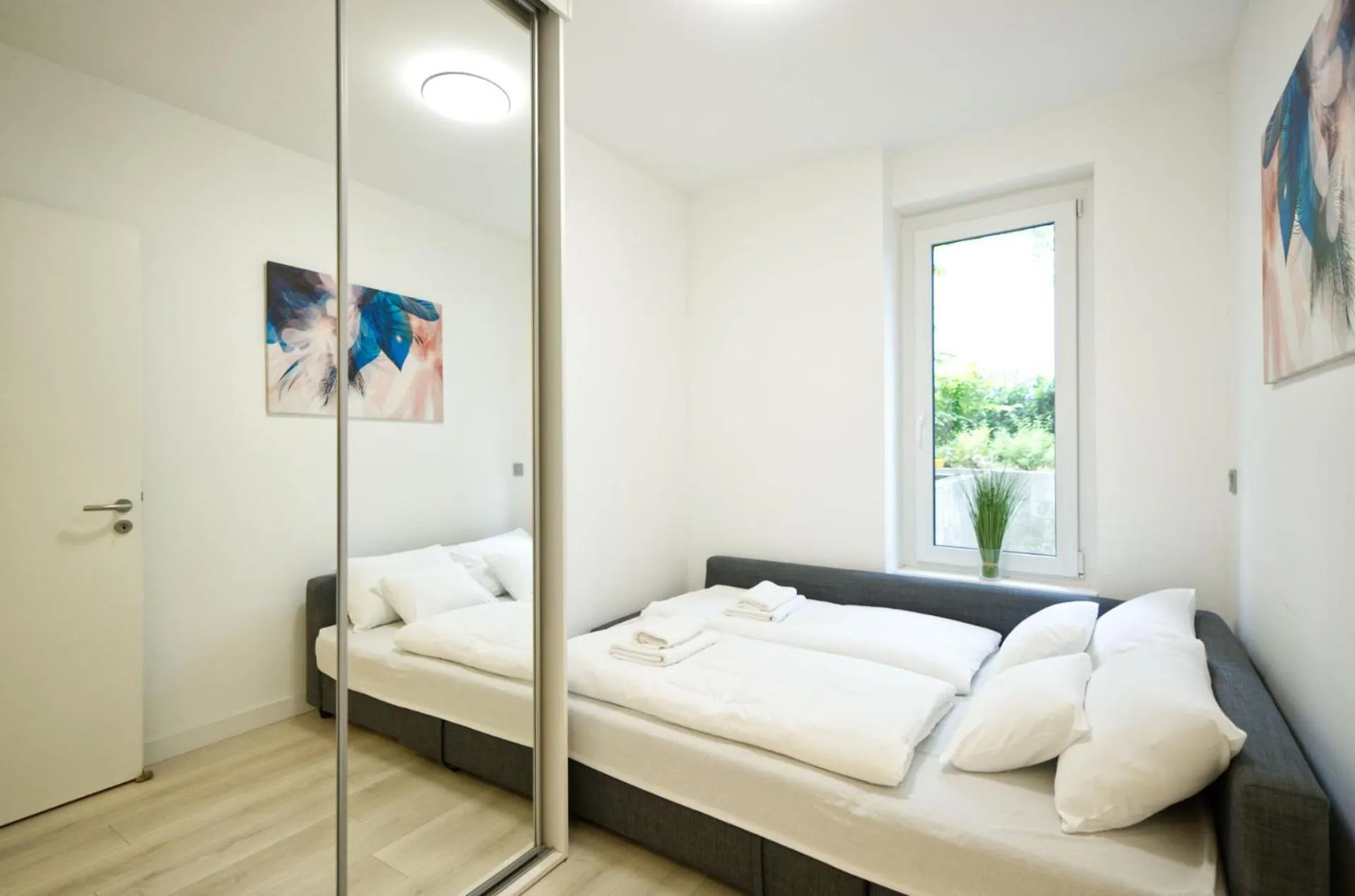 Bed in Elisabeth Downtown Apartments by FirstHost