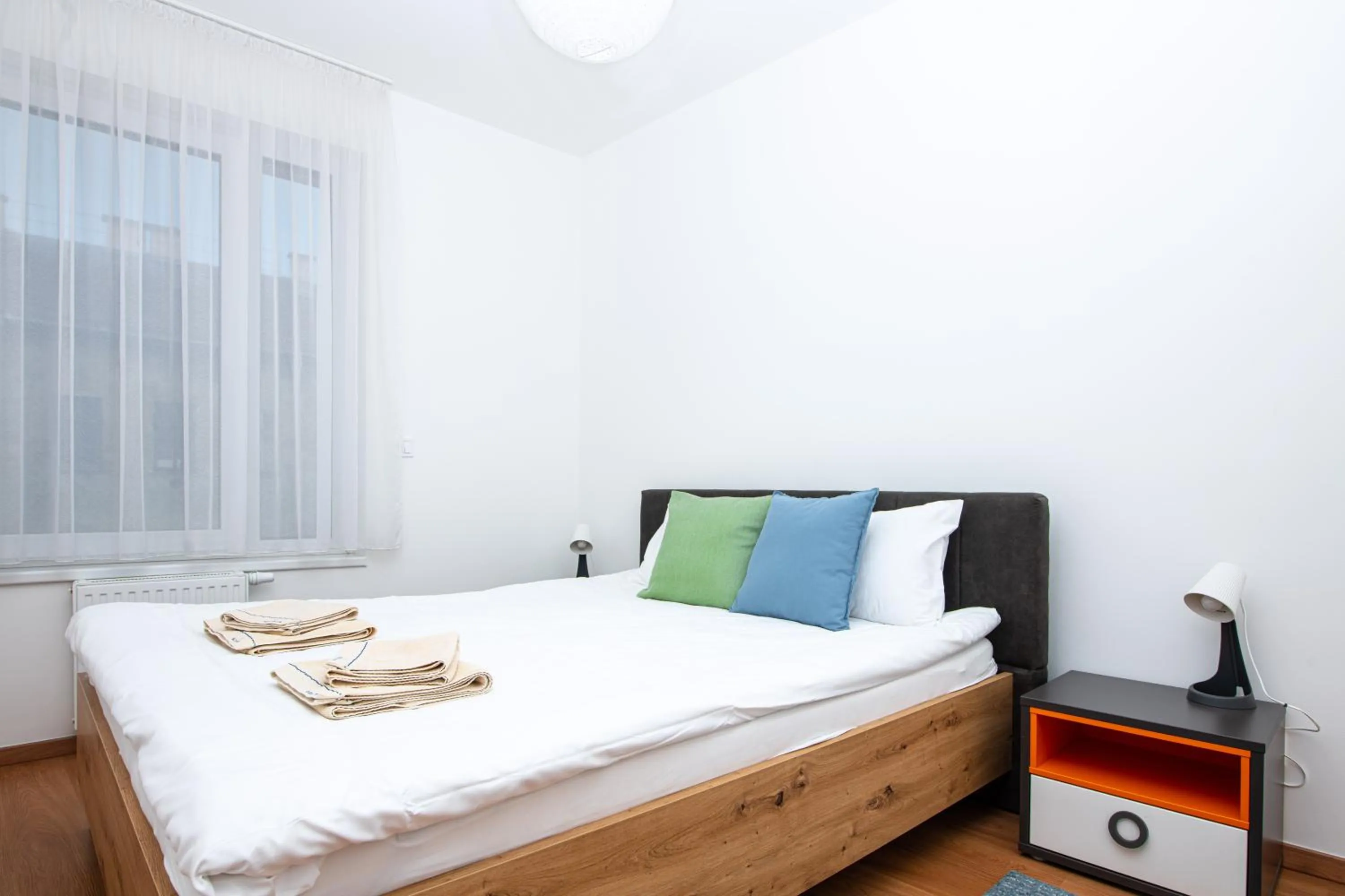 Bed in Elisabeth Downtown Apartments by FirstHost