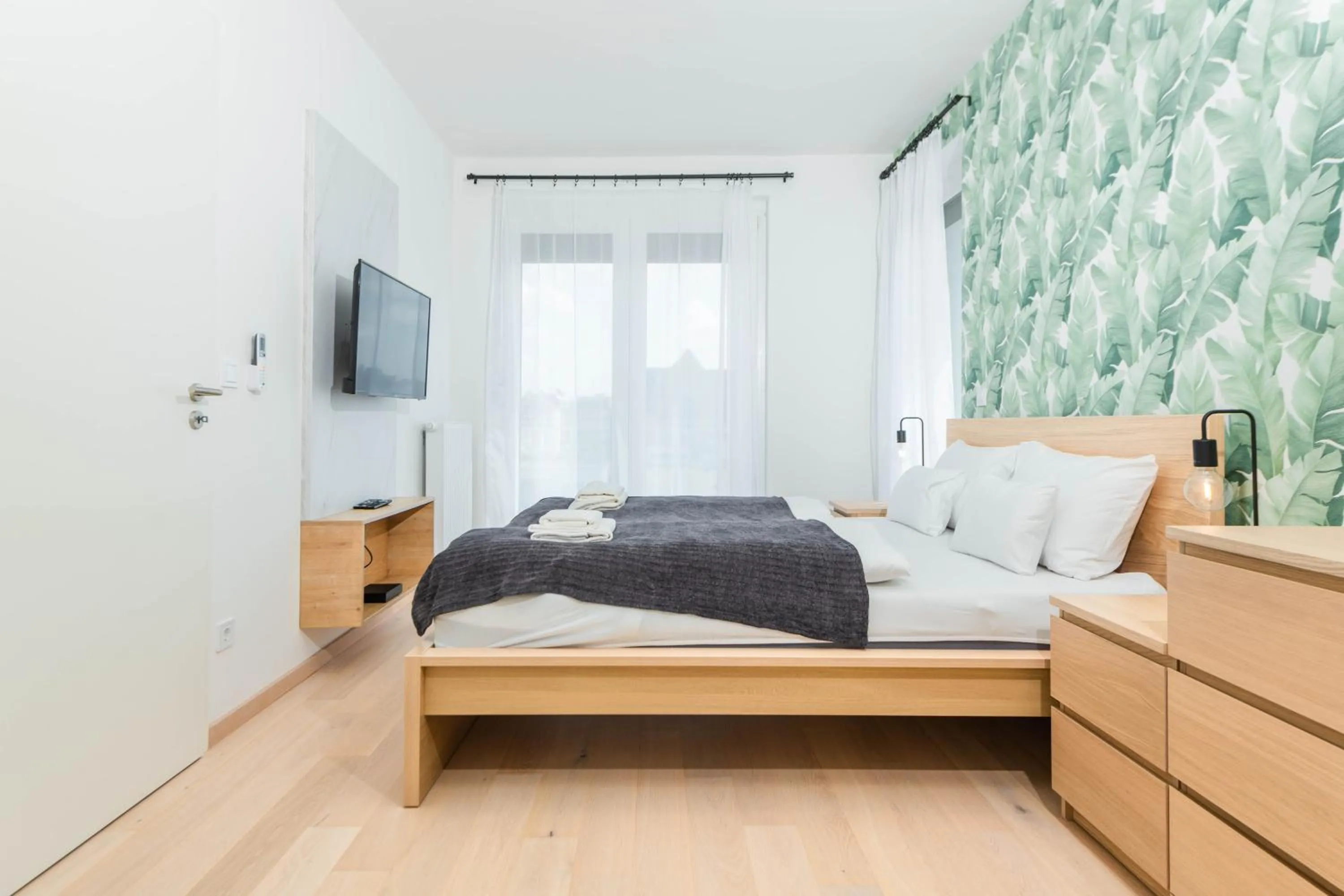 Bed in Elisabeth Downtown Apartments by FirstHost