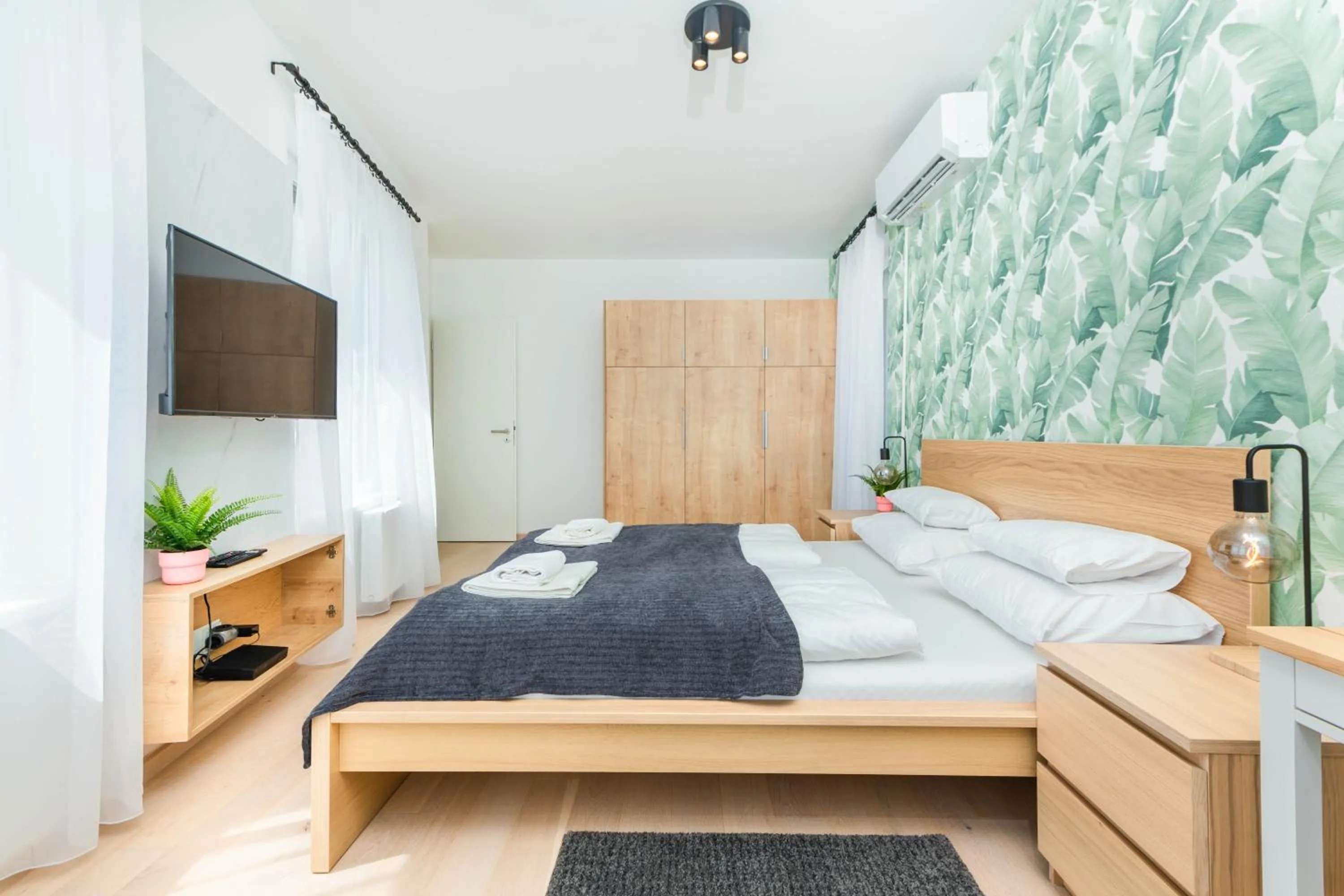 Bed in Elisabeth Downtown Apartments by FirstHost