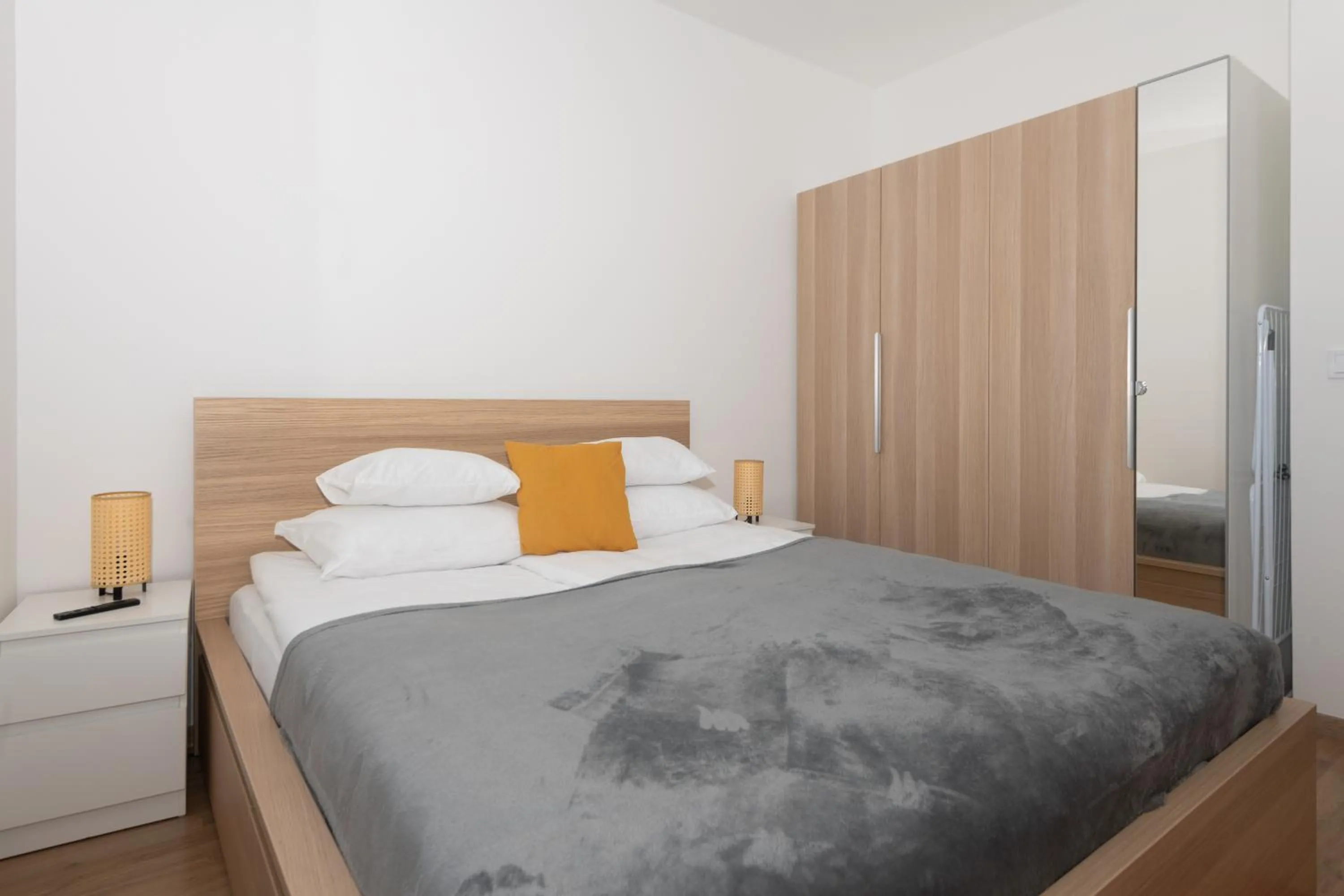 Bed in Elisabeth Downtown Apartments by FirstHost