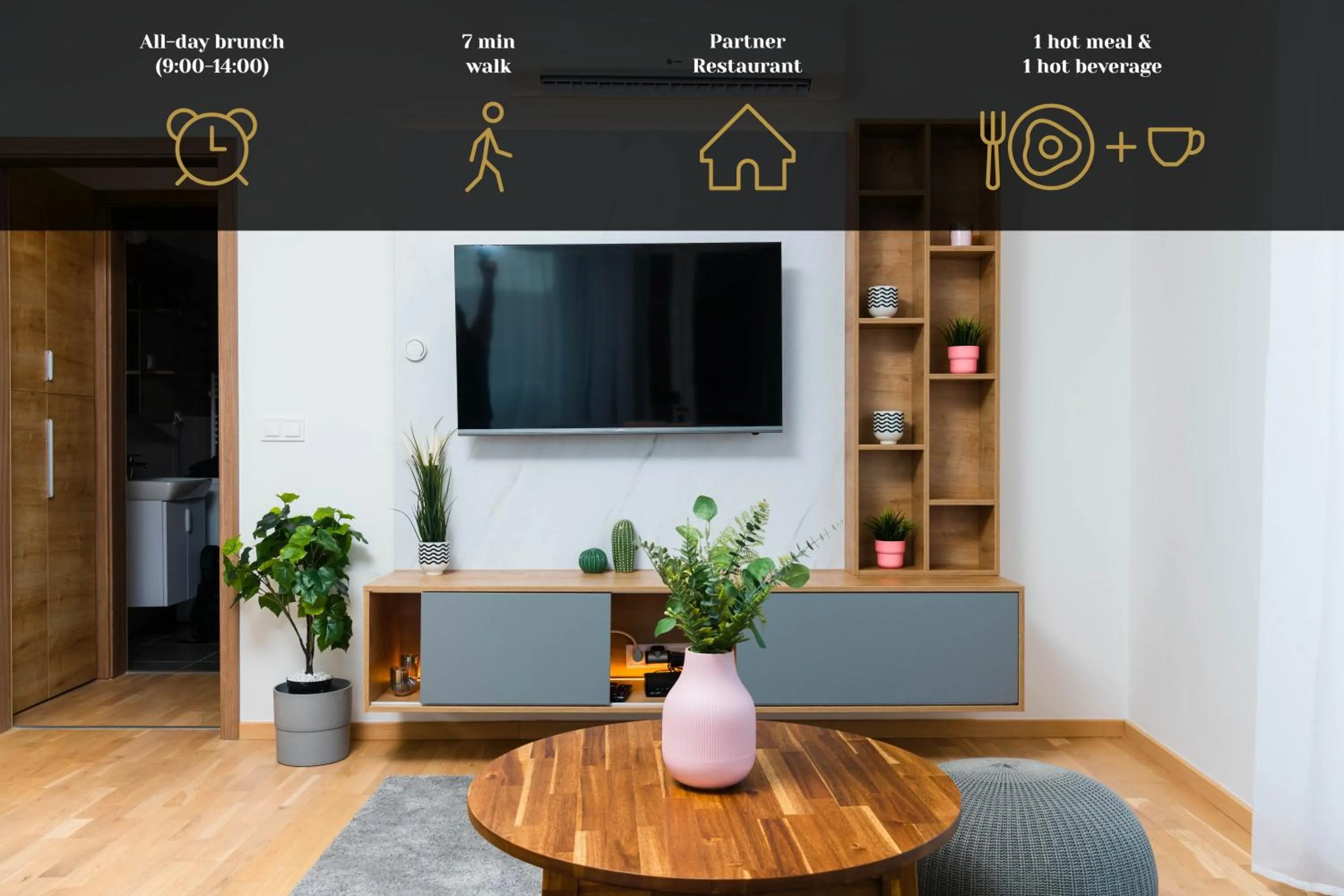 Communal lounge/ TV room in Elisabeth Downtown Apartments by FirstHost