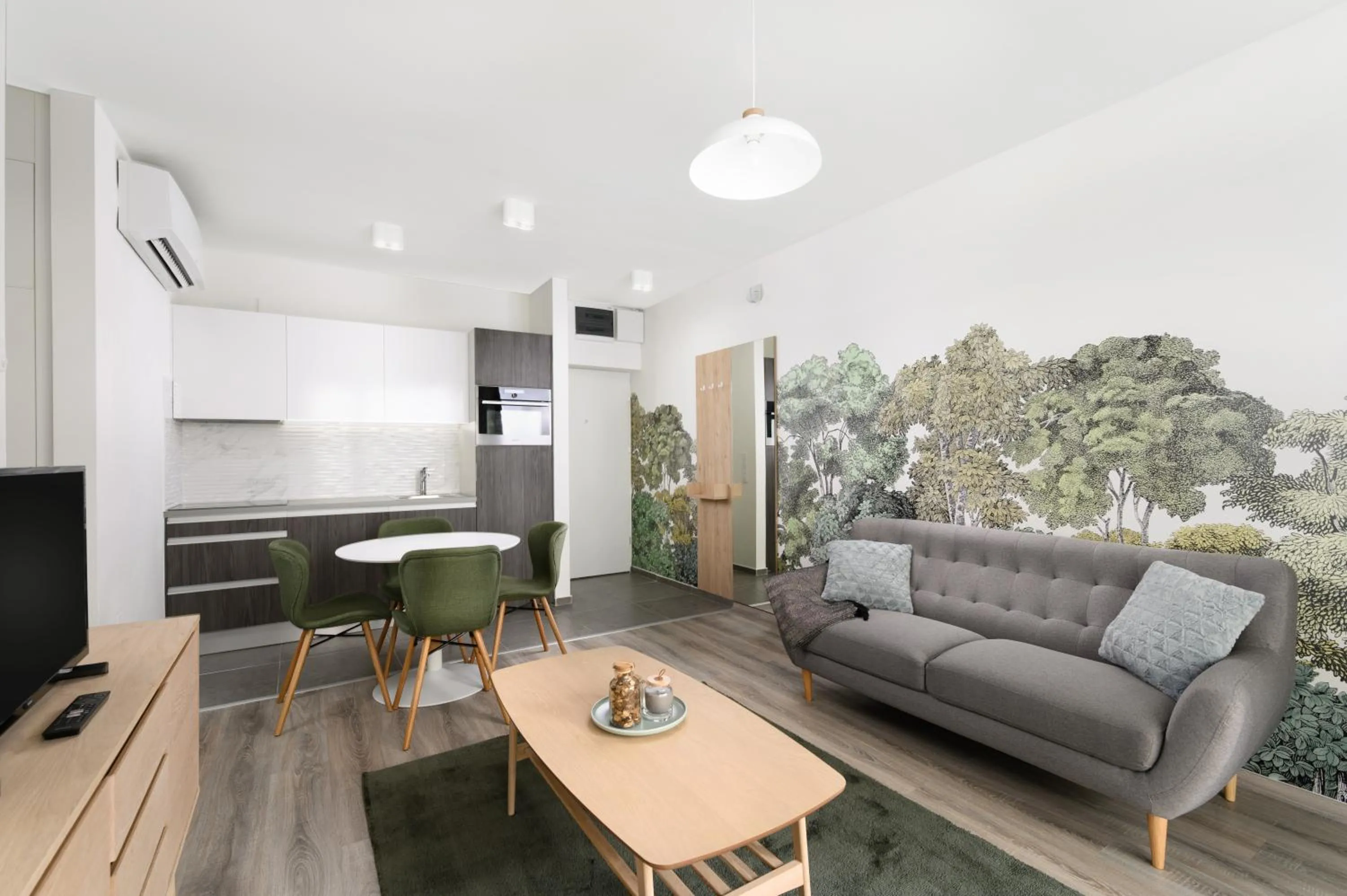 Communal lounge/ TV room in Elisabeth Downtown Apartments by FirstHost