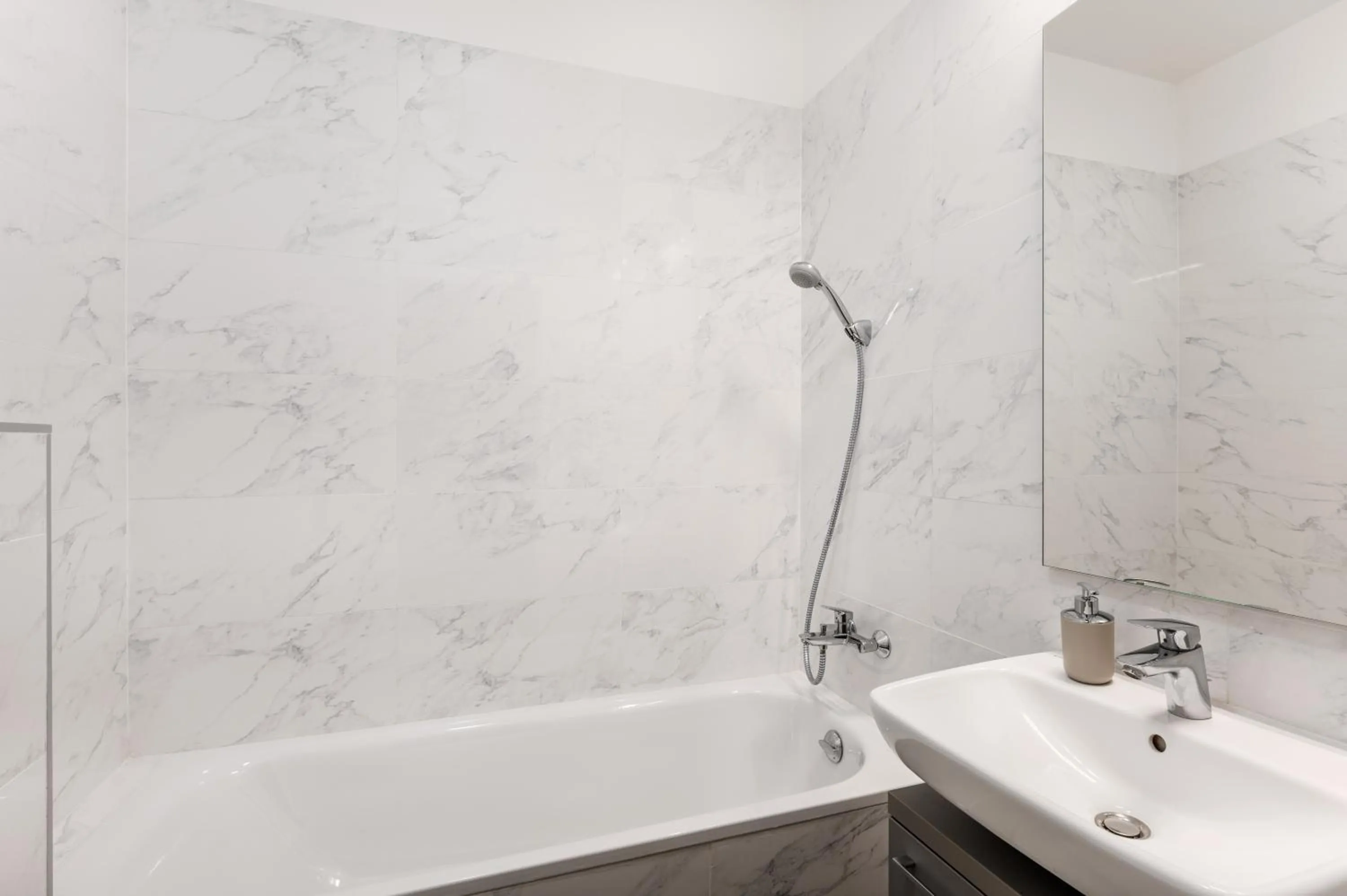 Shower in Elisabeth Downtown Apartments by FirstHost