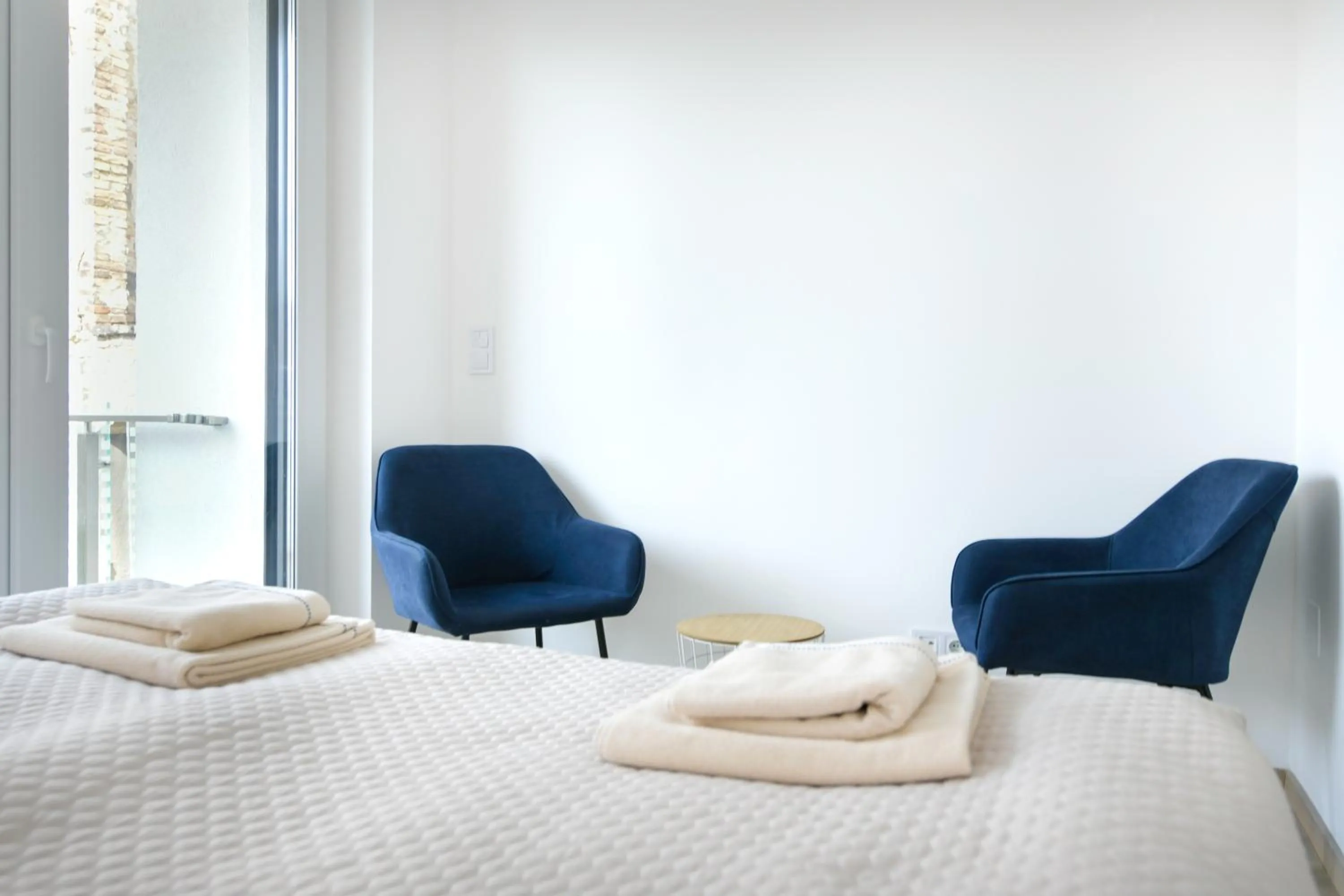 Bed in Elisabeth Downtown Apartments by FirstHost