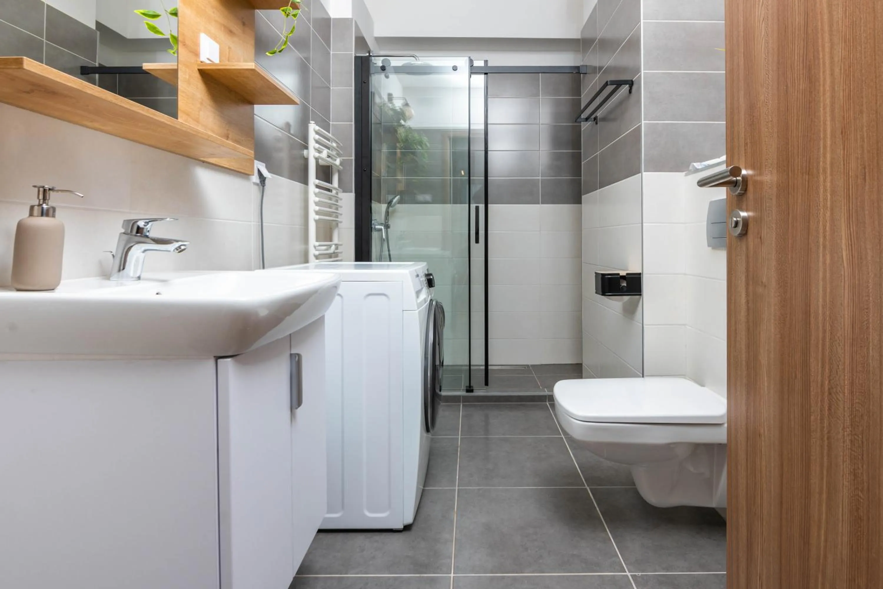 Shower in Elisabeth Downtown Apartments by FirstHost