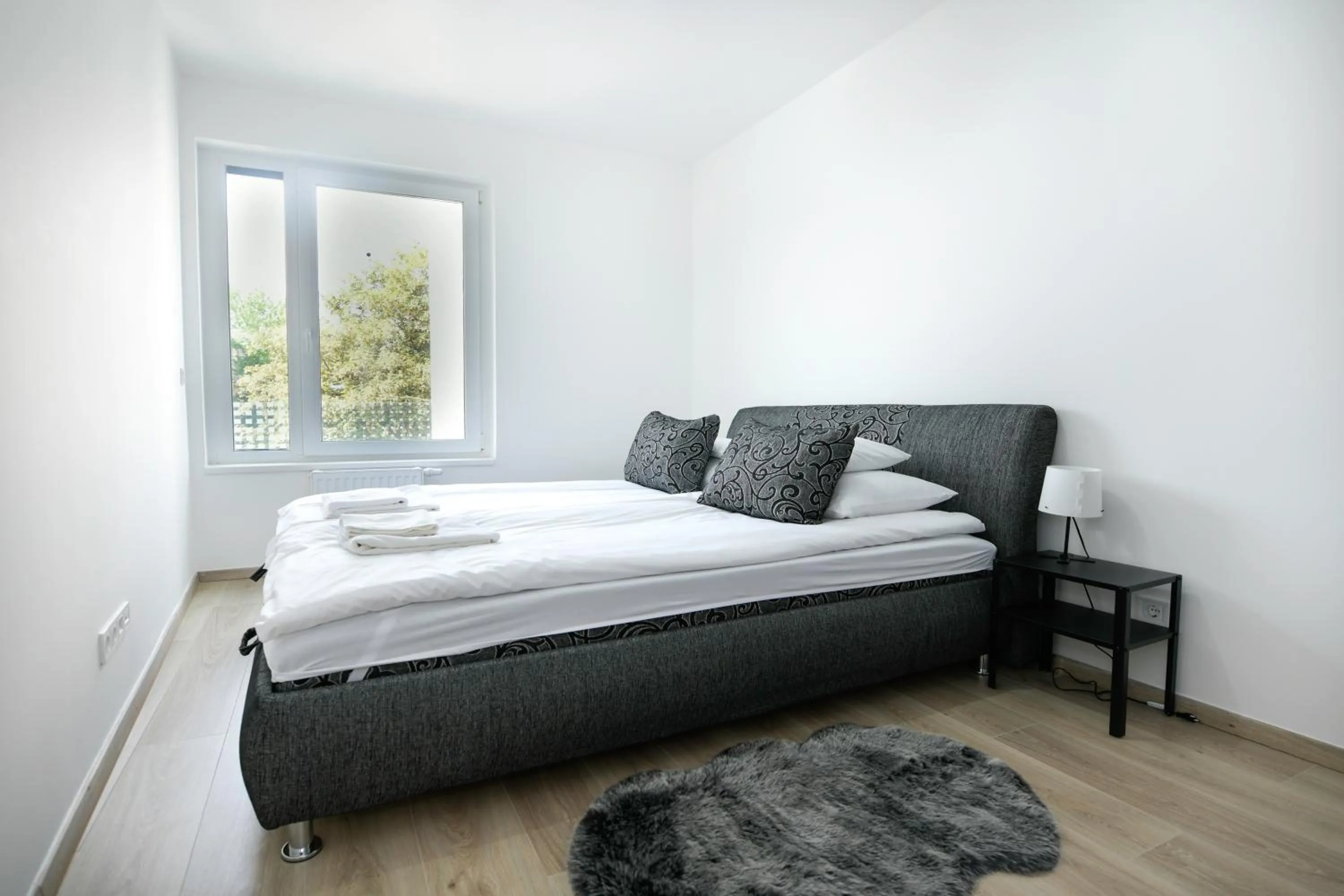 Bed in Elisabeth Downtown Apartments by FirstHost