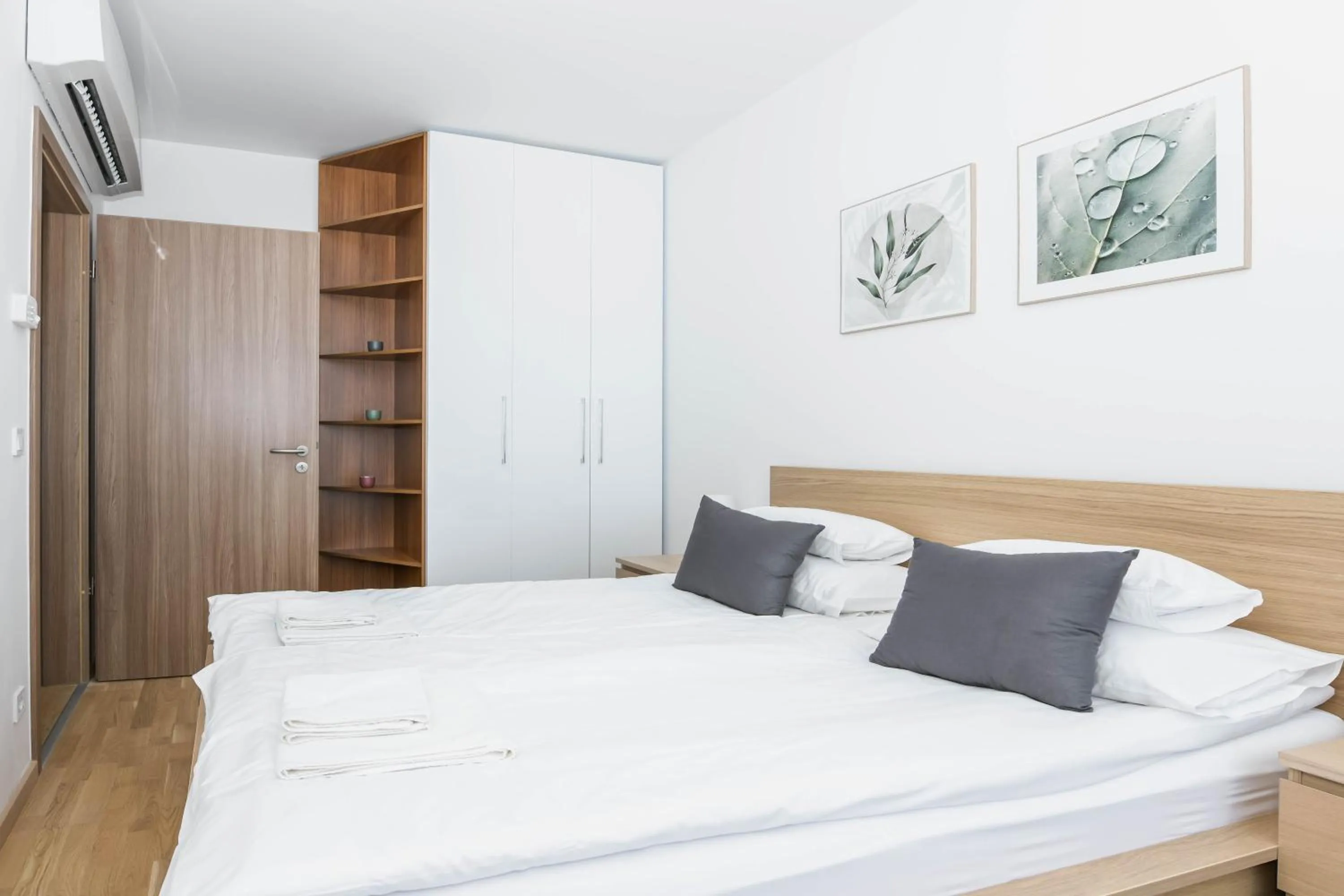 Bed in Elisabeth Downtown Apartments by FirstHost