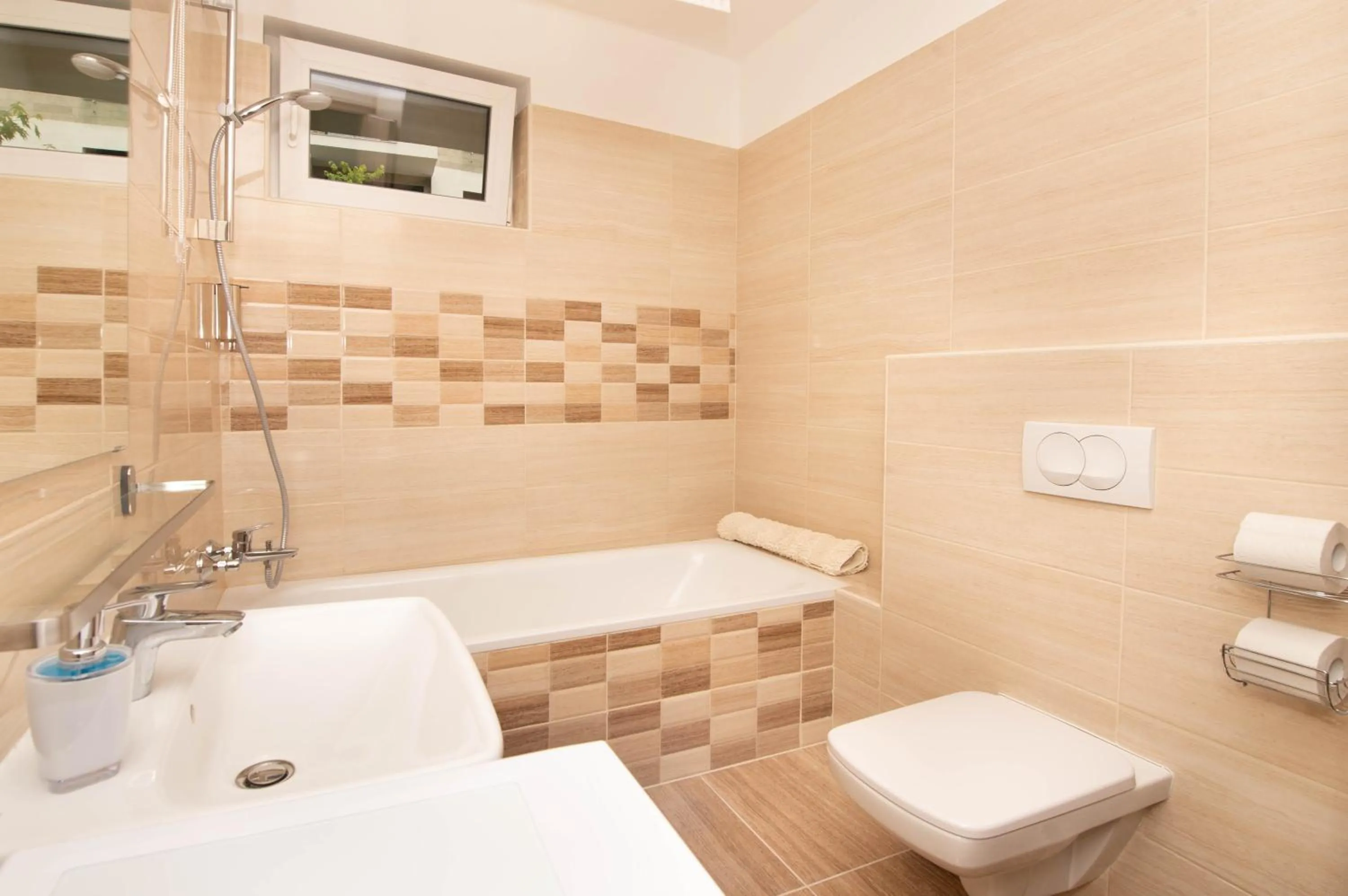 Shower in Elisabeth Downtown Apartments by FirstHost