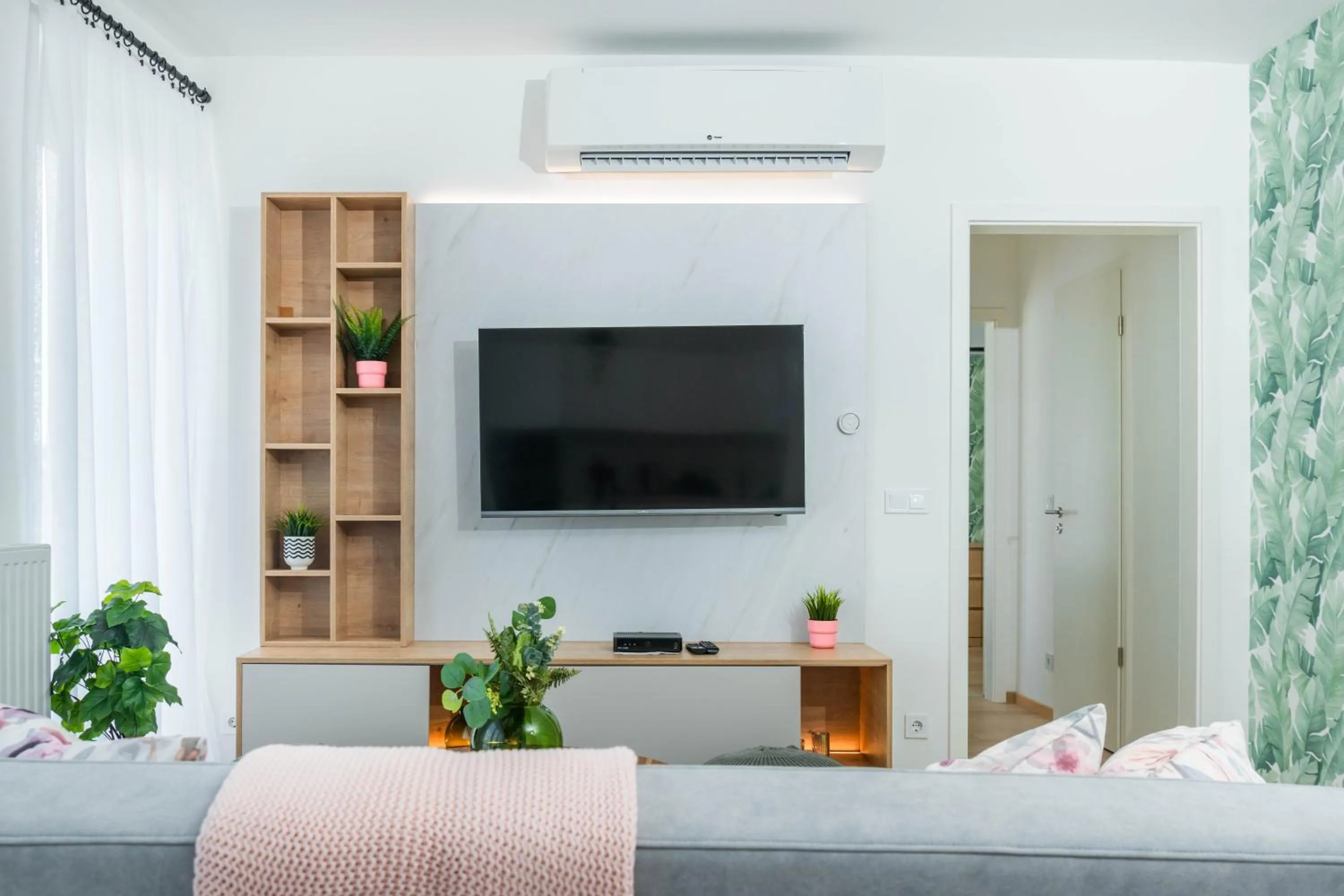 Communal lounge/ TV room in Elisabeth Downtown Apartments by FirstHost