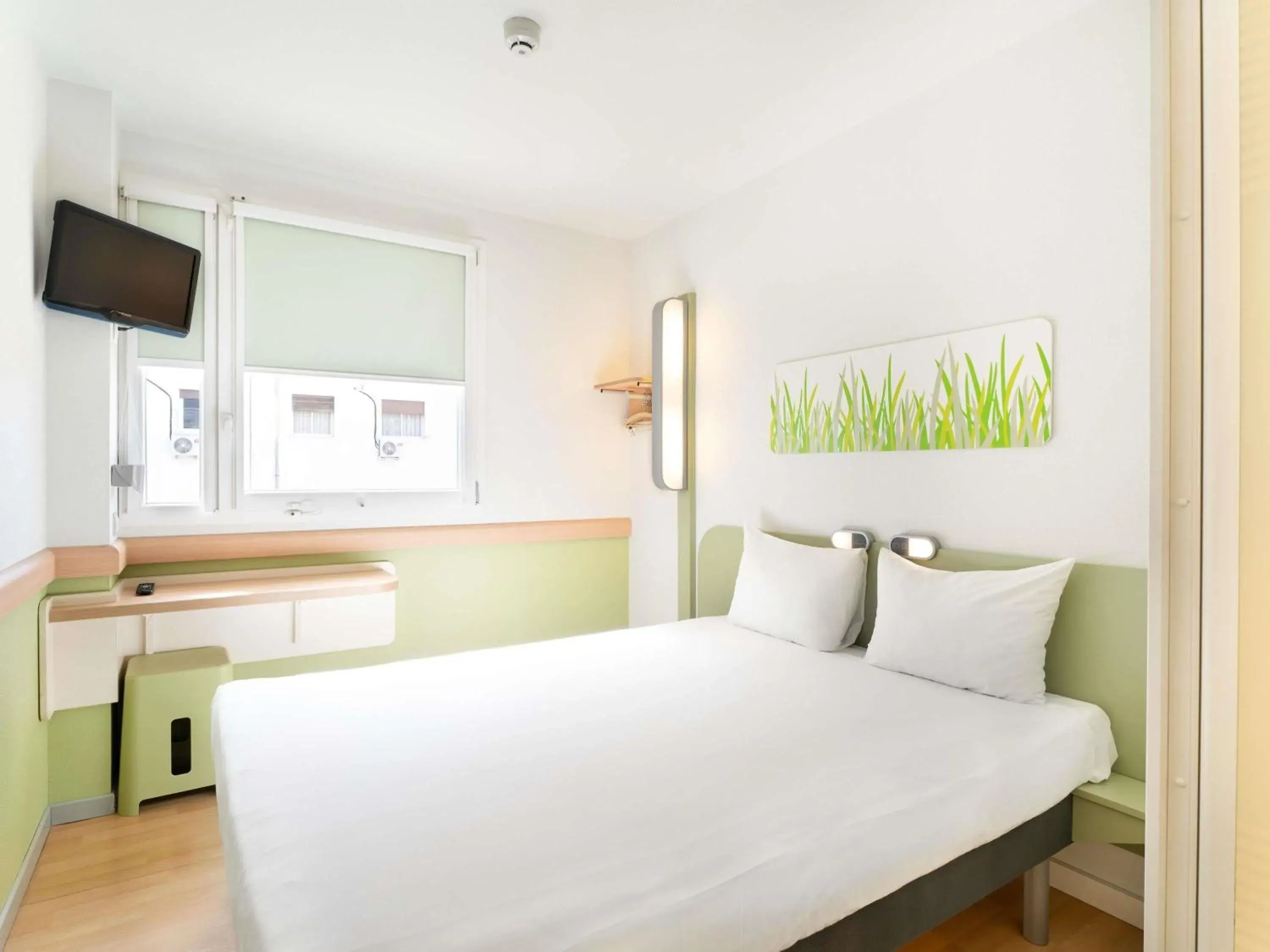 Bedroom, Bed in Ibis Budget Madrid Centro Las Ventas Bedroom, Bed in Ibis Budget Madrid Centro Las Ventas