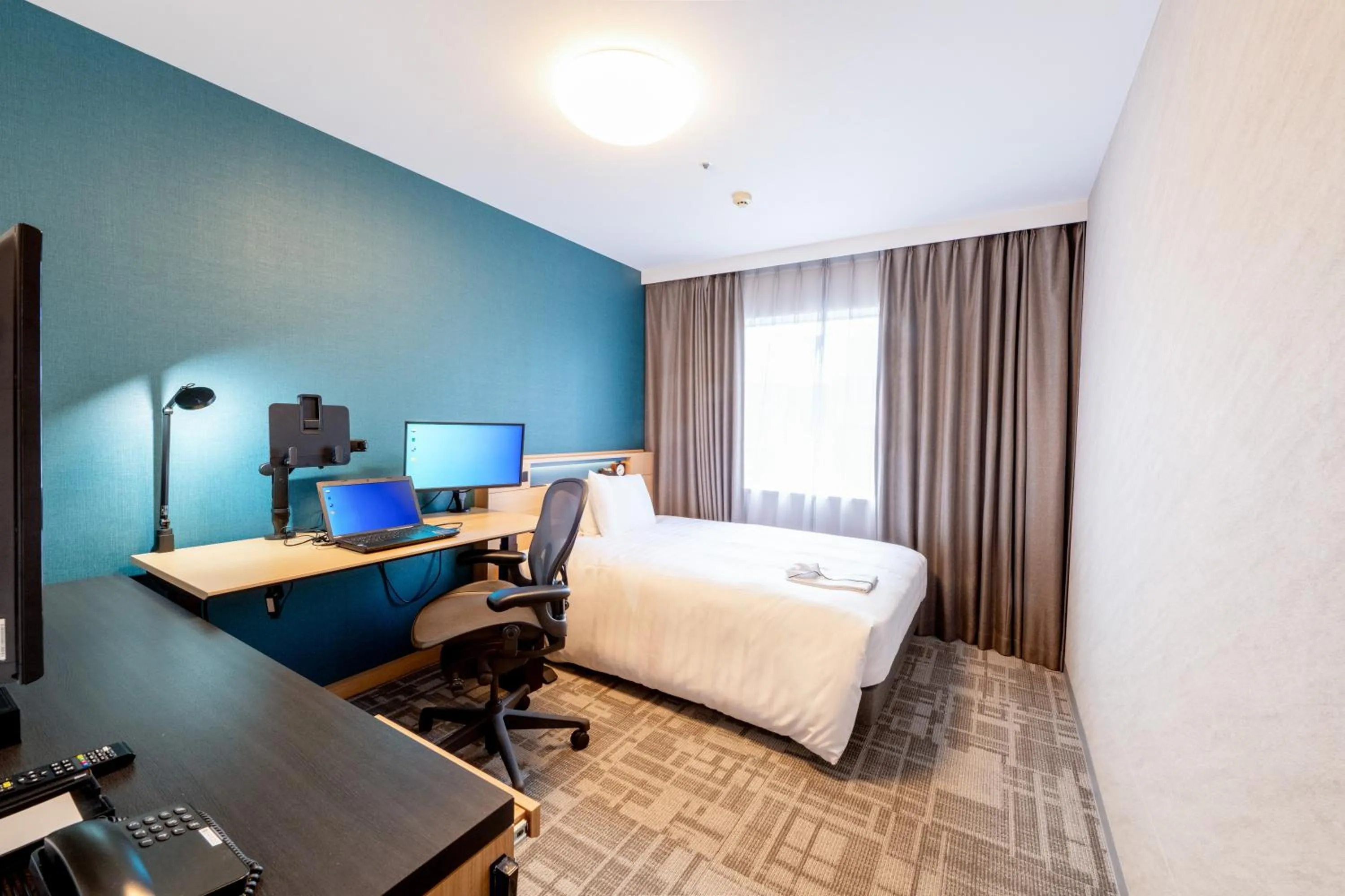 Photo of the whole room, Bed in Richmond Hotel Kagoshima Tenmonkan