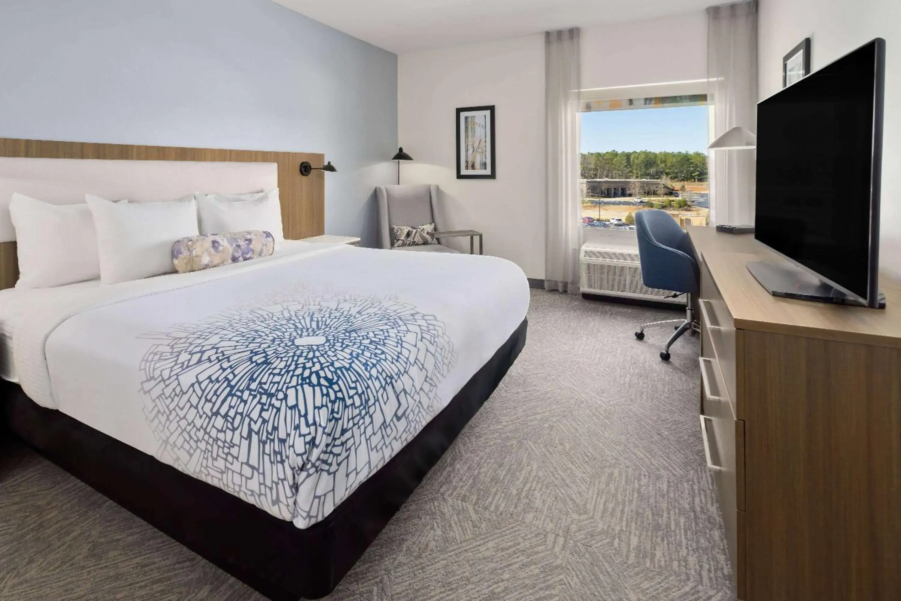 Bed in La Quinta Inn & Suites by Wyndham Locust Grove Bed in La Quinta Inn & Suites by Wyndham Locust Grove