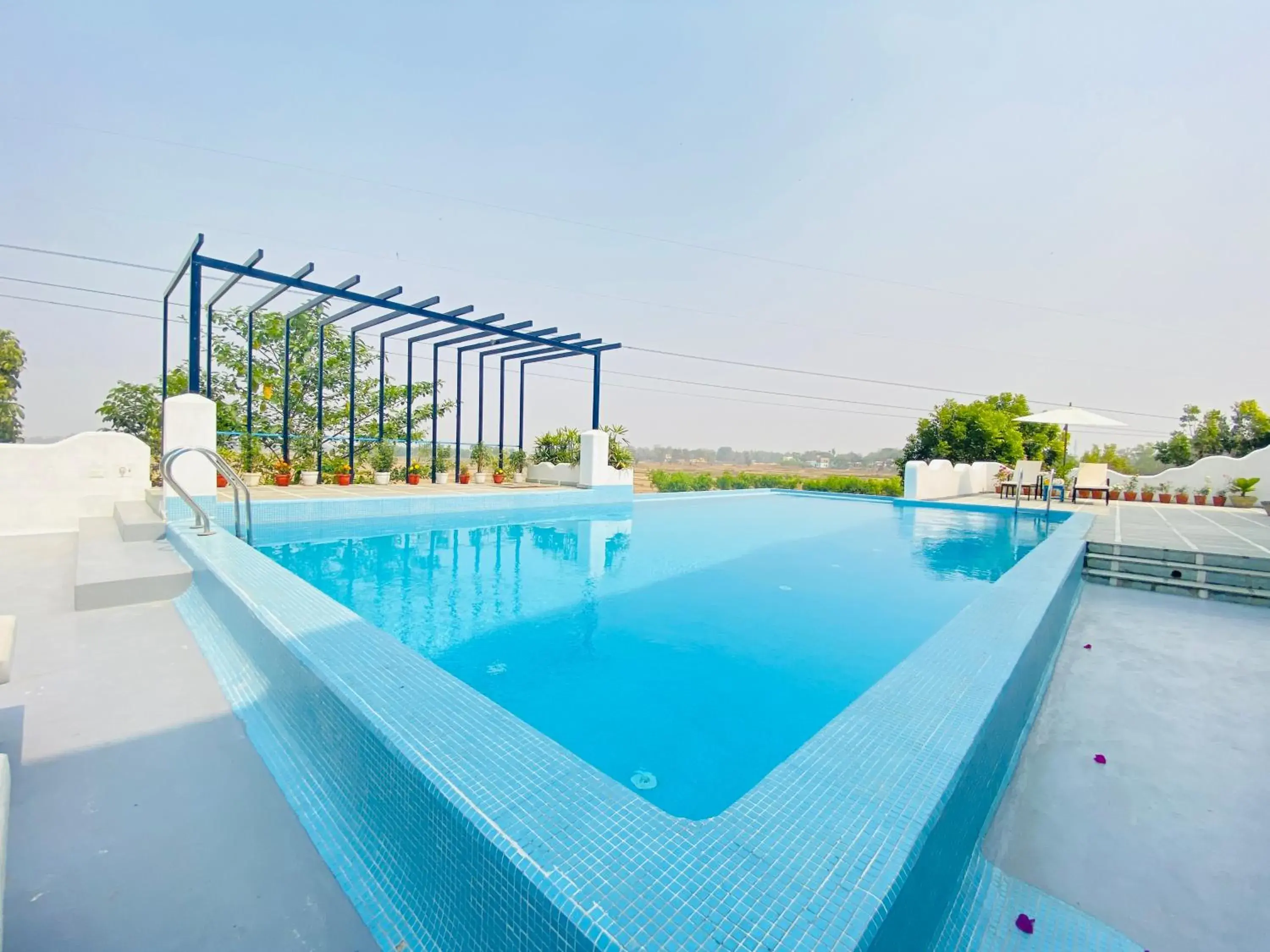 Swimming pool in Ananda Resorts Shantiniketan Swimming pool in Ananda Resorts Shantiniketan
