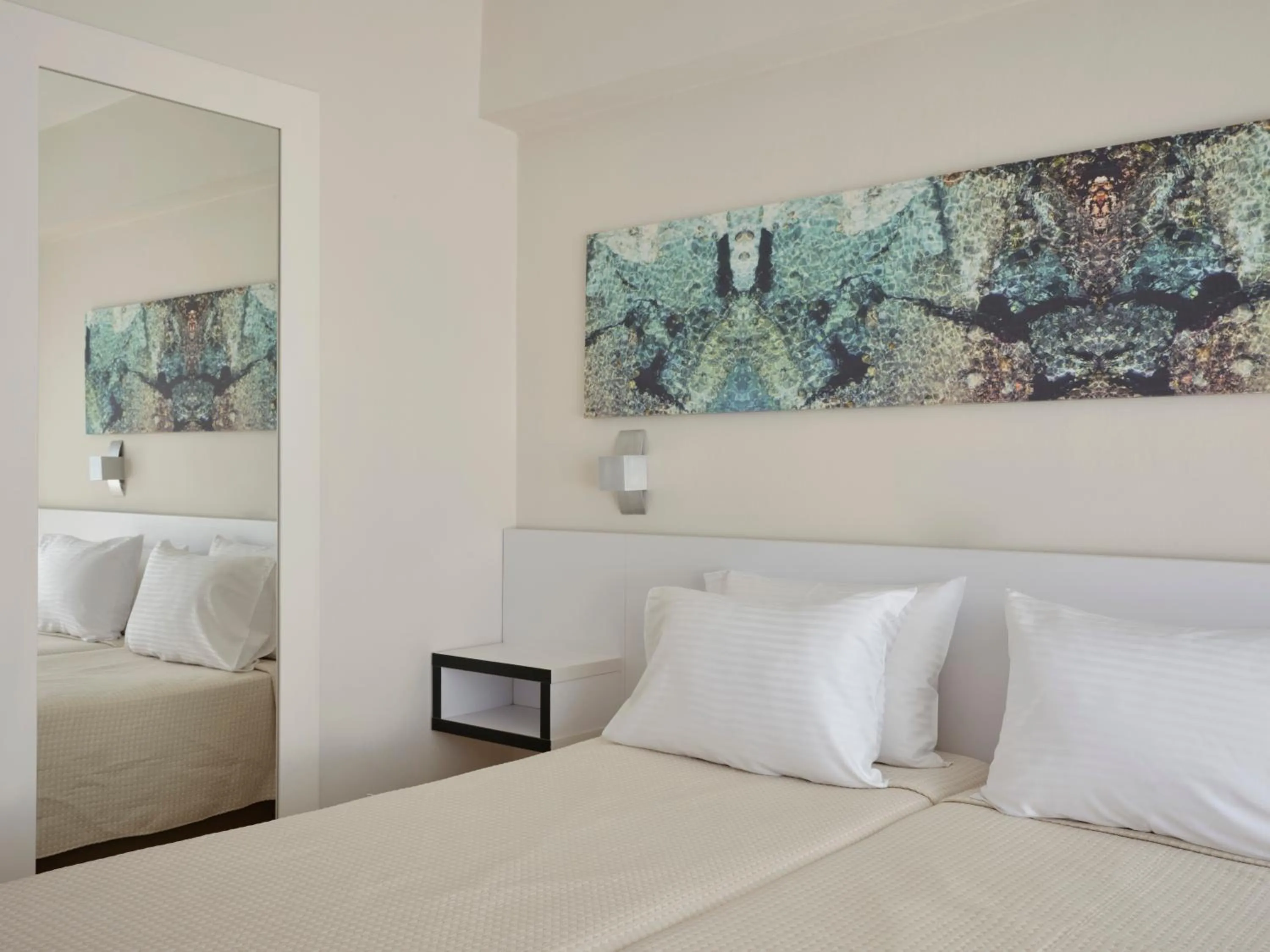 Bed in Atlantica Sancta Napa Hotel