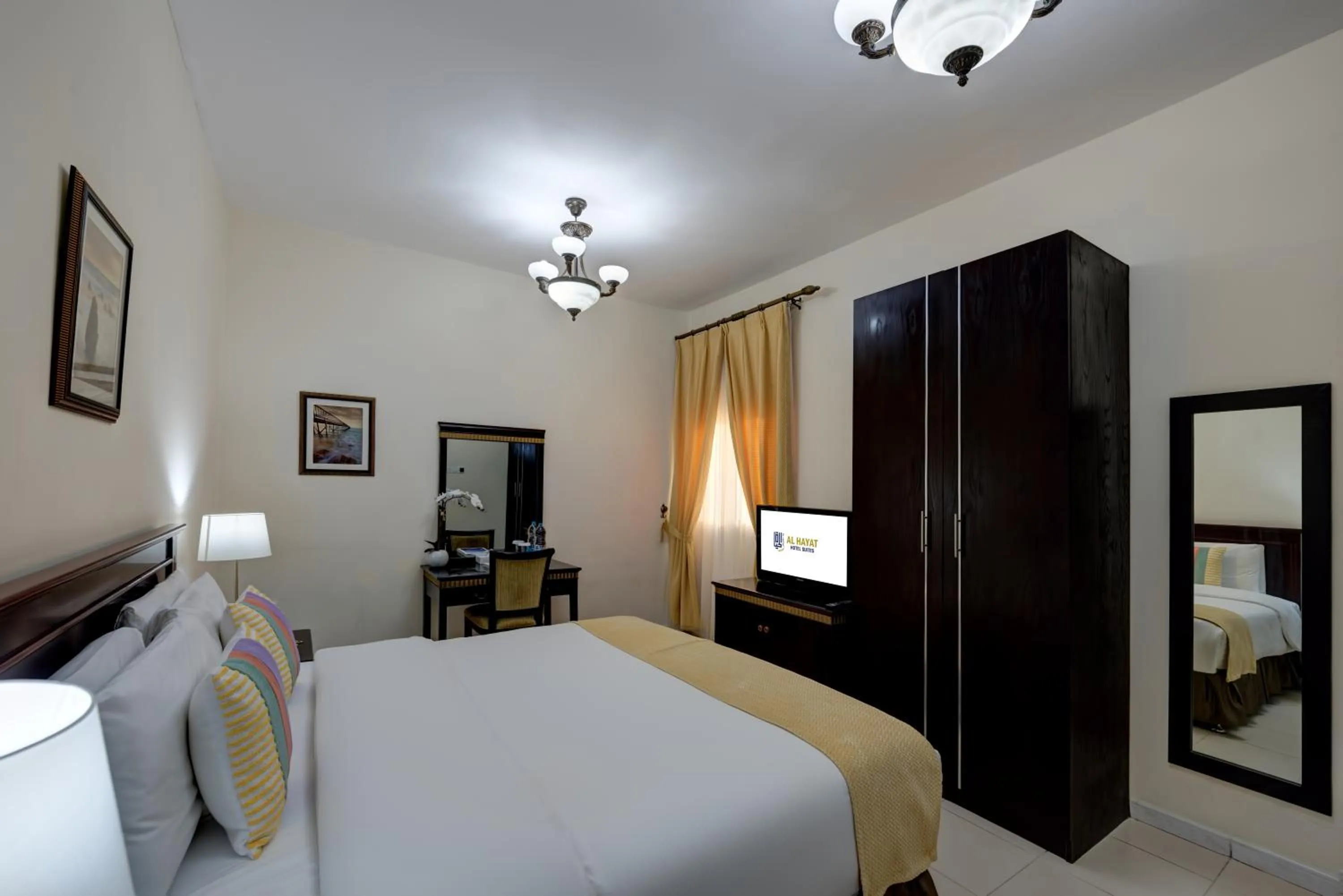 Bed in Al Hayat Hotel Apartments