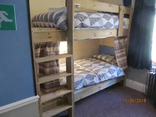 Bed in Male Dormitory Room in Les Fleurs Accommodation Bed in Male Dormitory Room in Les Fleurs Accommodation