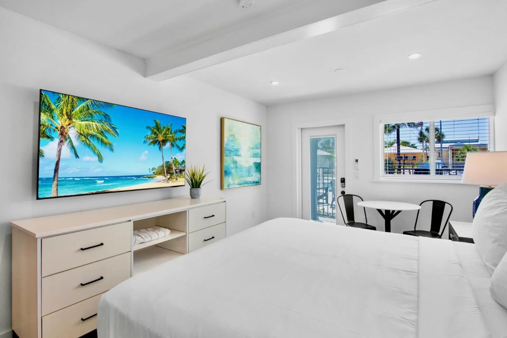 Bed in Pelican Post at Anna Maria Island Inn