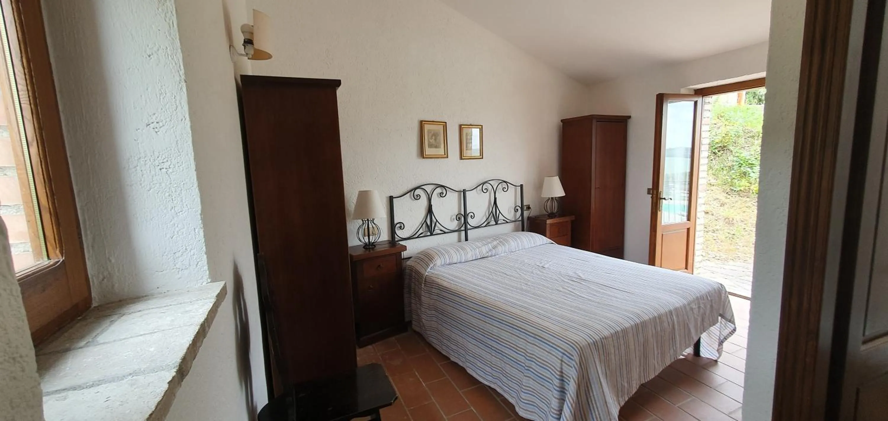 Bed in PoloTuristicoUmbria Rustico con Piscina Vista Lago