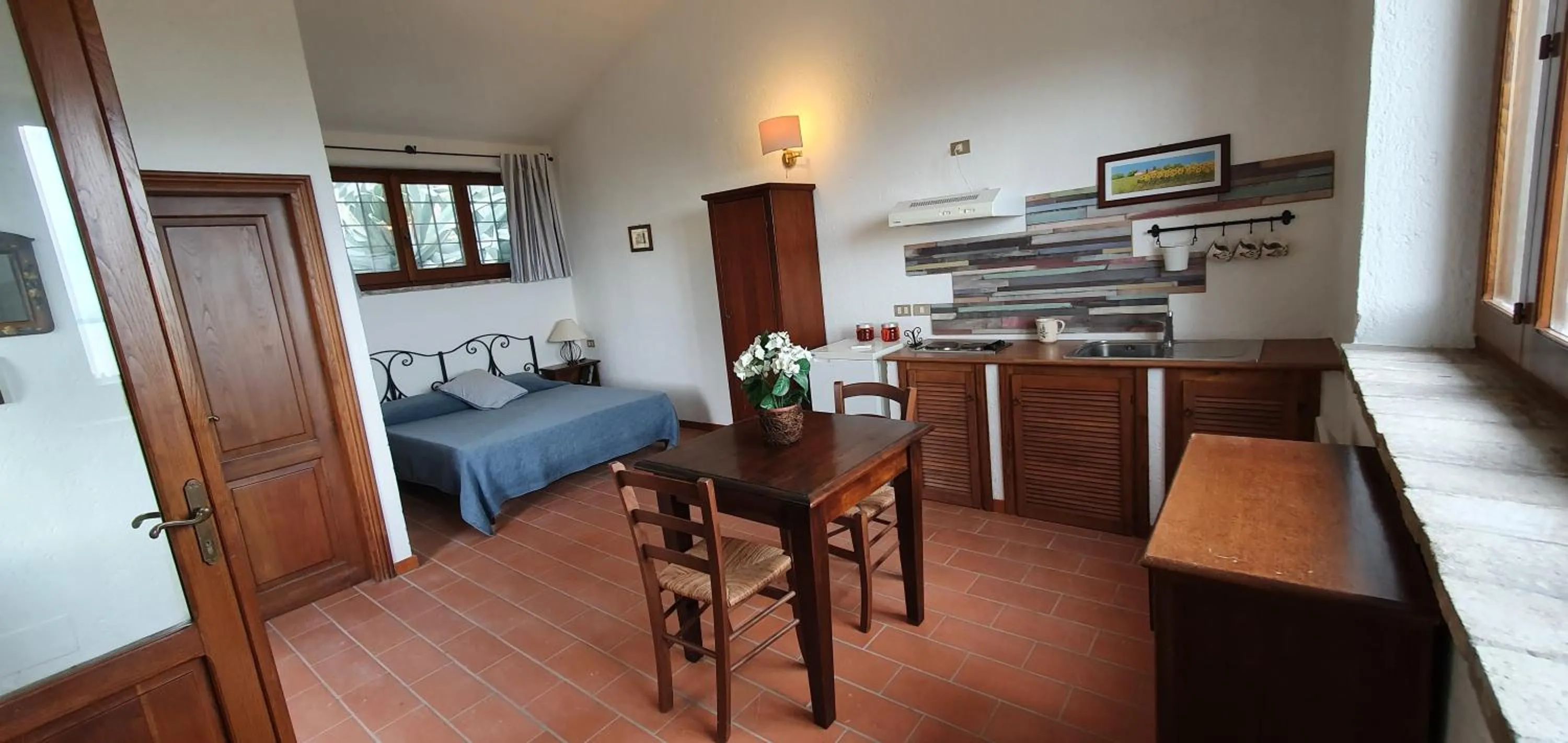 Kitchen or kitchenette, Bed in PoloTuristicoUmbria Rustico con Piscina Vista Lago