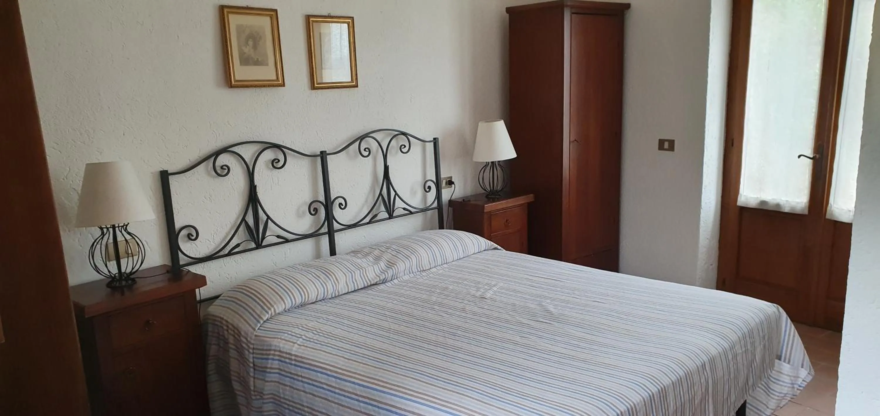 Bed in PoloTuristicoUmbria Rustico con Piscina Vista Lago