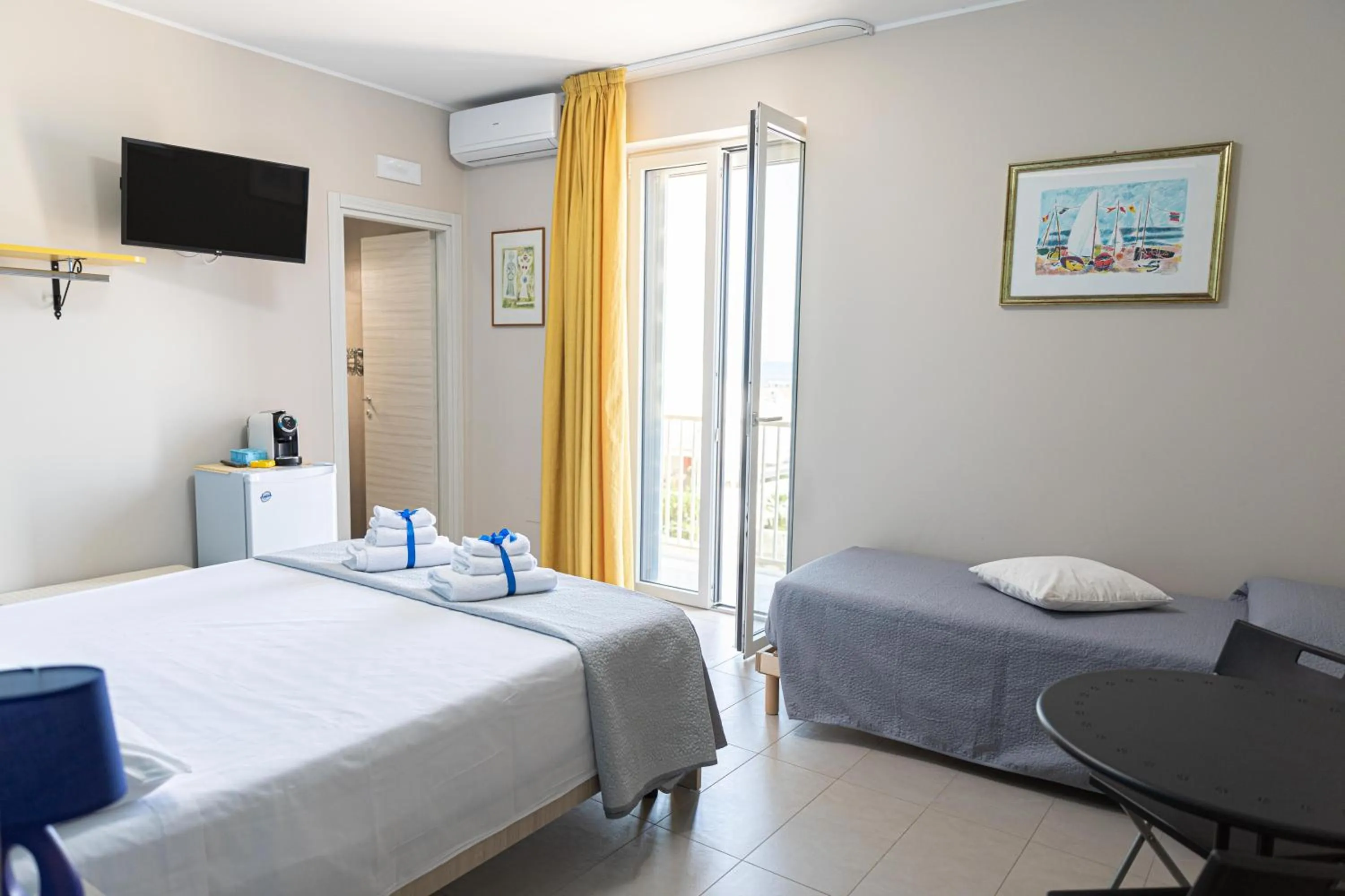 Bed in 16TH FAD ROOMS