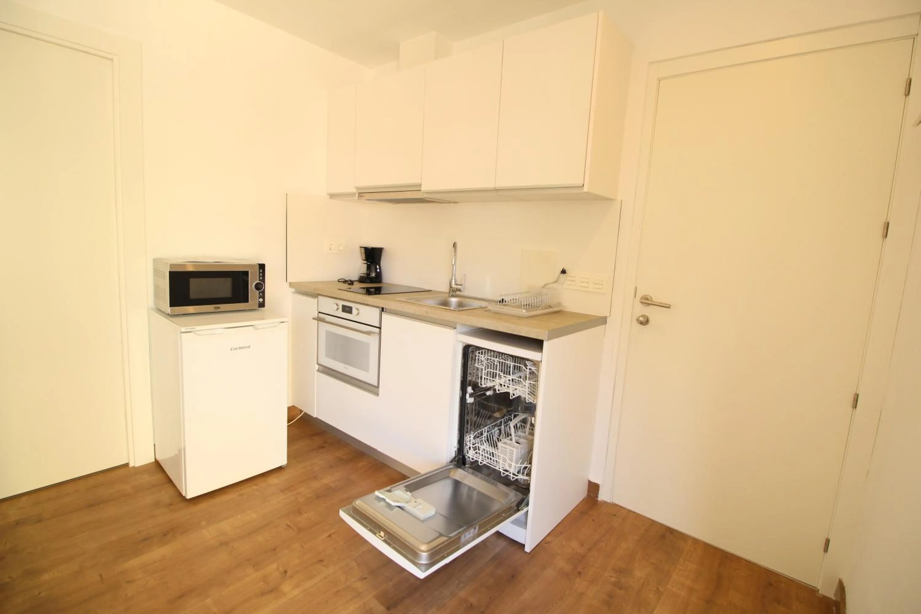 Kitchen or kitchenette in Apartamentos Boni