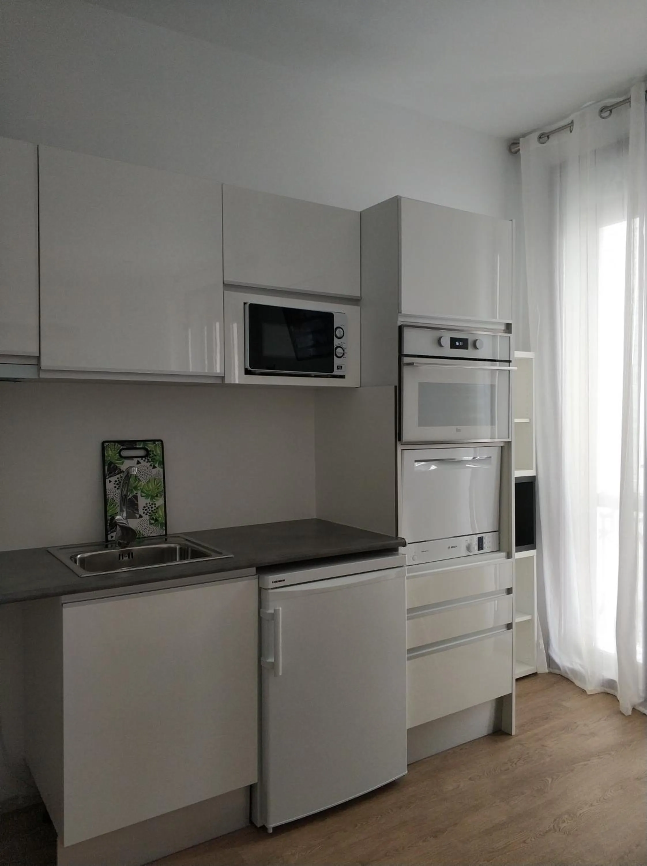 Kitchen or kitchenette in Apartamentos Boni