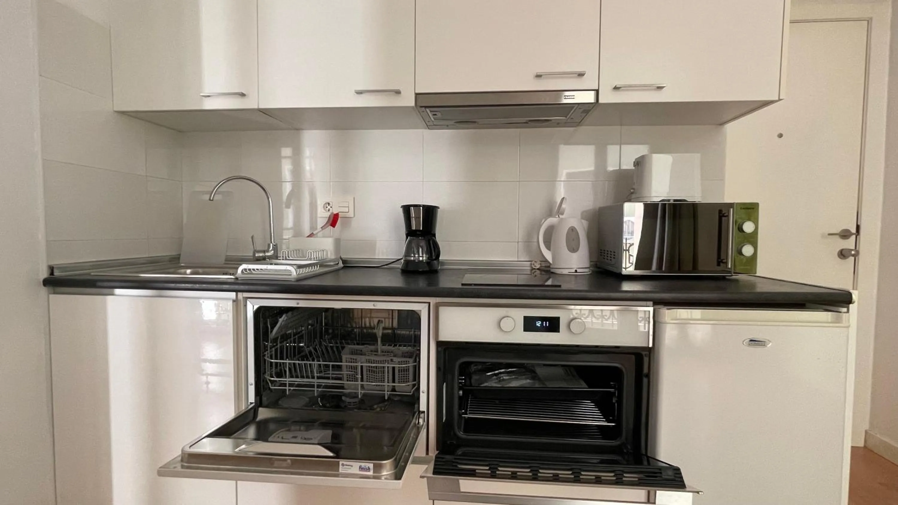 Kitchen or kitchenette in Apartamentos Boni