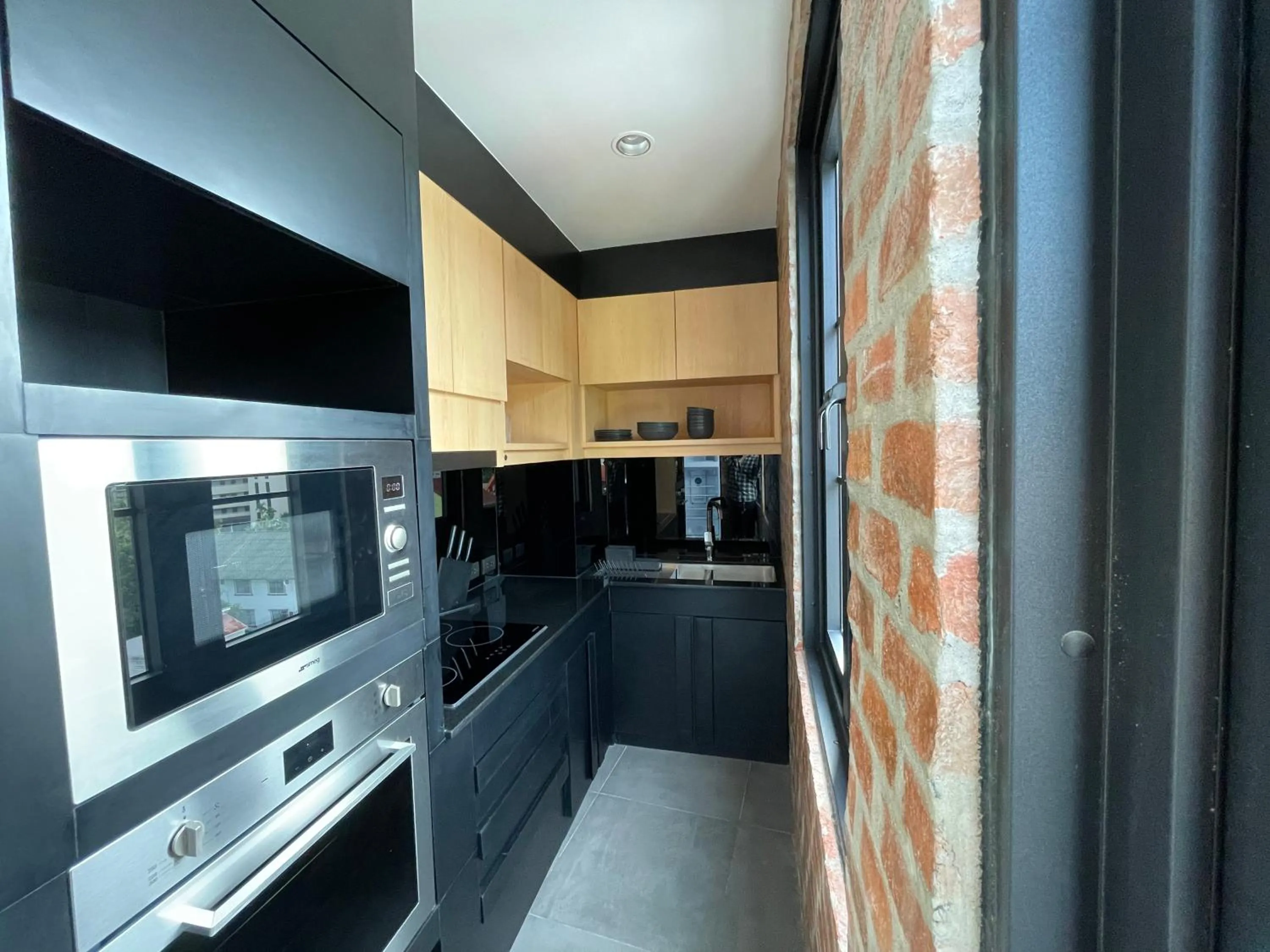 Kitchen or kitchenette in Room Actually Service Apartment