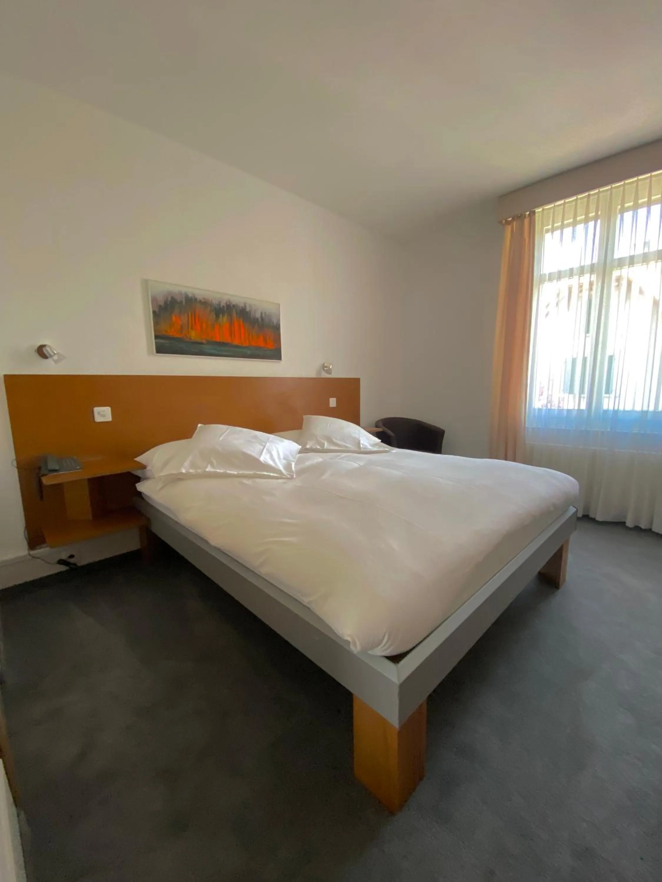 Bed in Hotel De La Paix